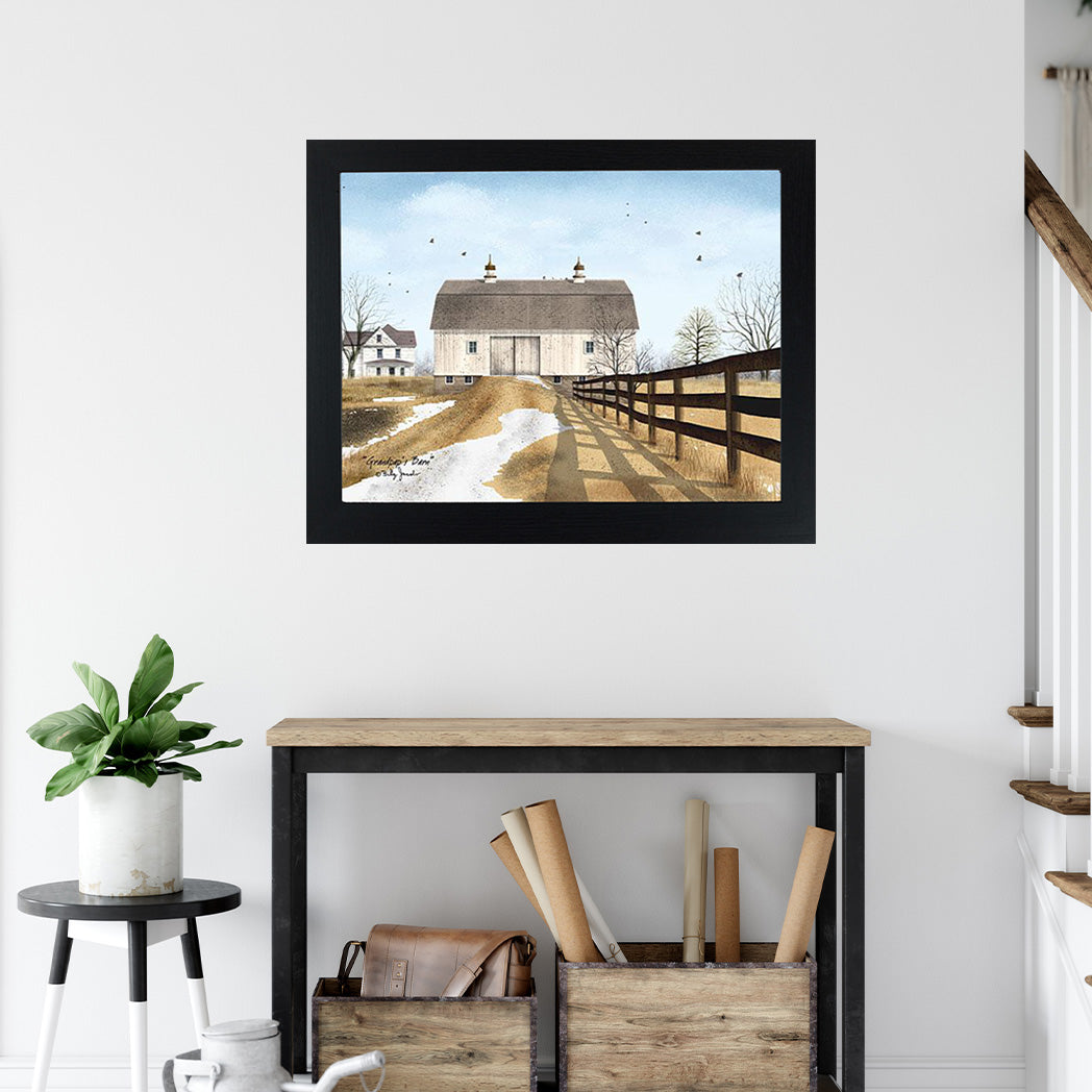 Framed Billy Jacobs country print featuring a rustic barn in a snowy winter scene – glittered and ready to display