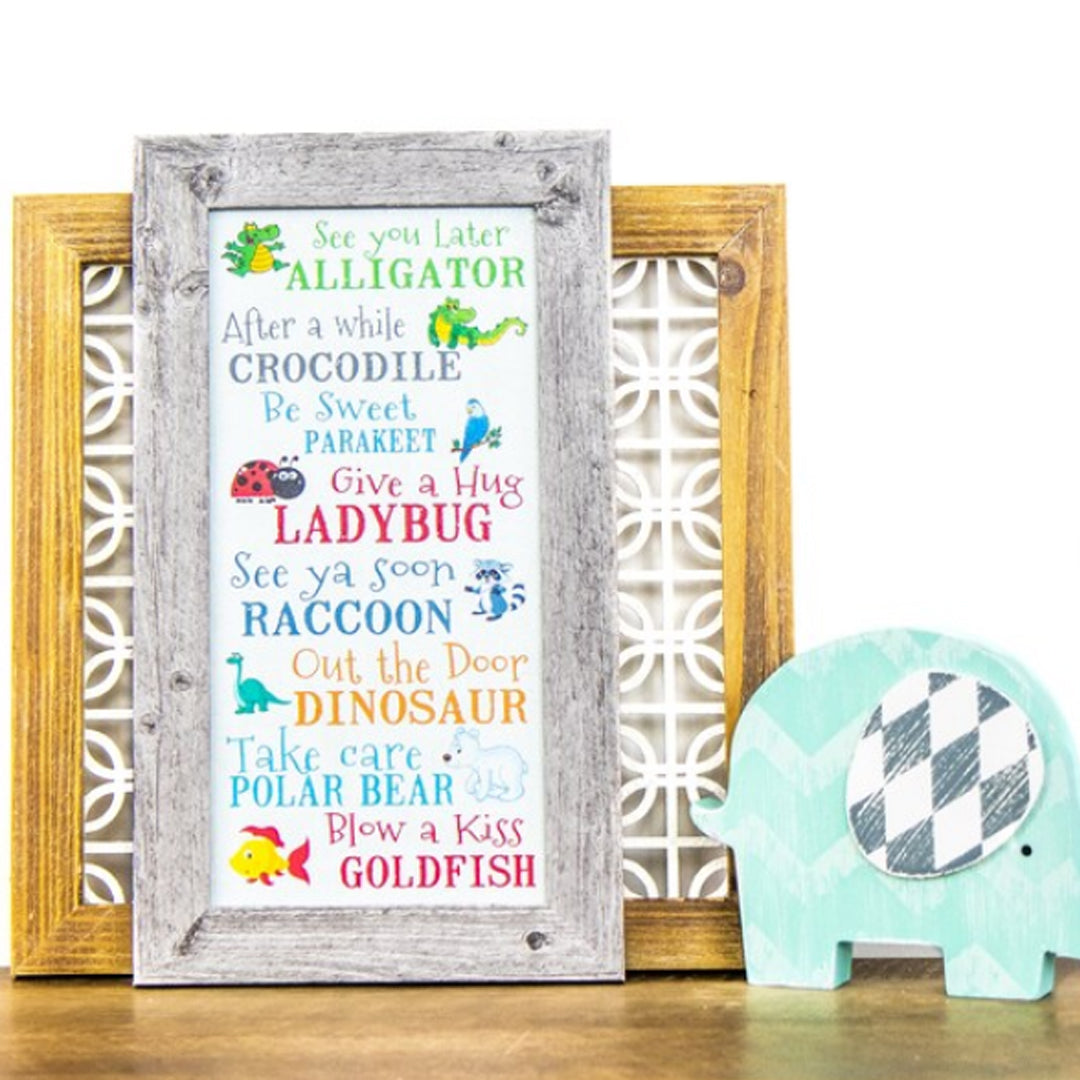 Framed nursery wall art with soft animals and meaningful sayings for children's rooms