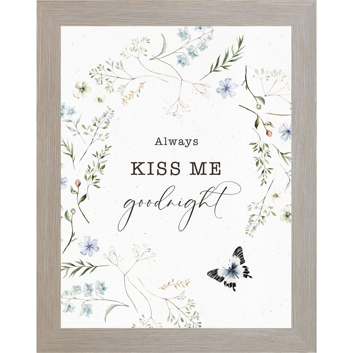 Floral wreath wall art with the words “Always Kiss Me Goodnight” on a soft white background with greenery and a butterfly.