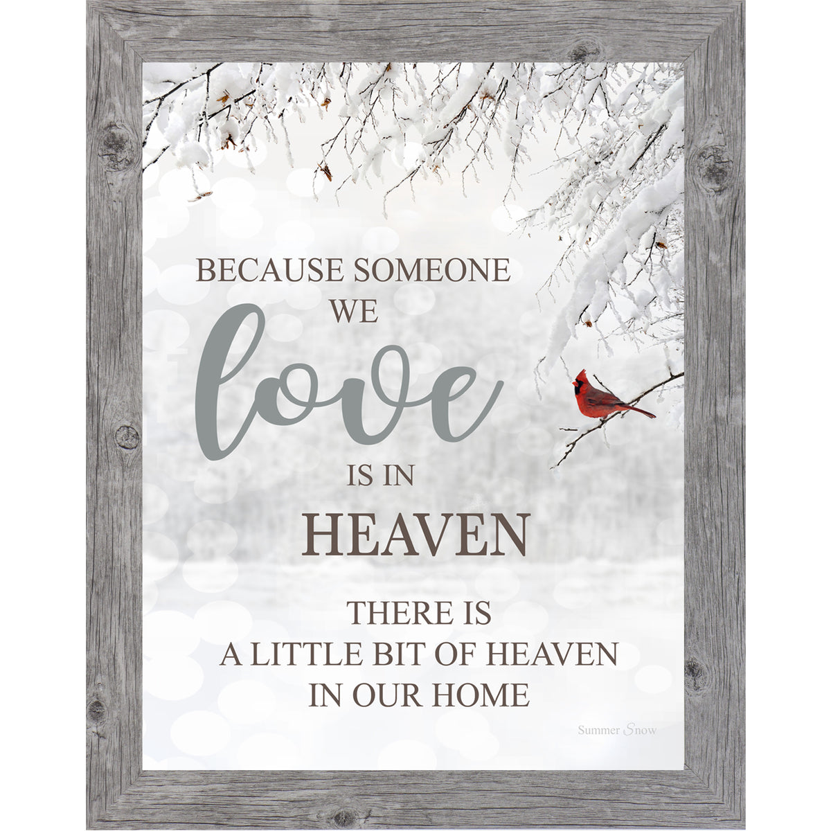 Framed sympathy wall art with the quote “Because someone we love is in heaven, there is a little bit of heaven in our home,” displayed over a misty evergreen forest background.