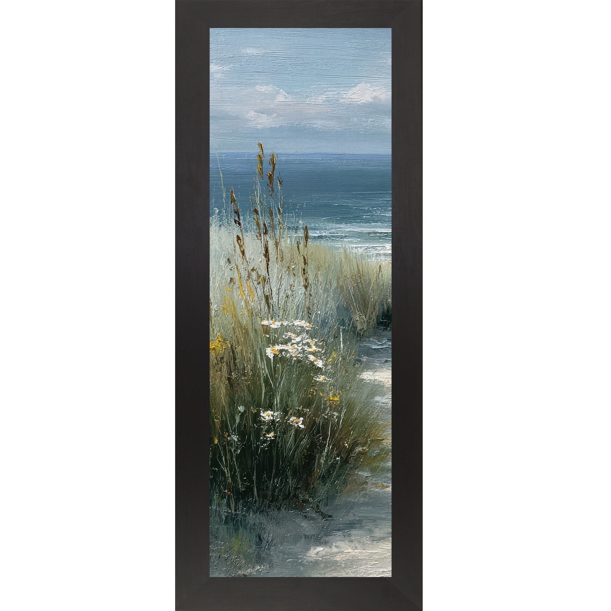 Black framed narrow portrait coastal path left panel wall art featuring tall golden cattails and sea grasses with white daisies and yellow wildflowers and deep teal ocean in the distance