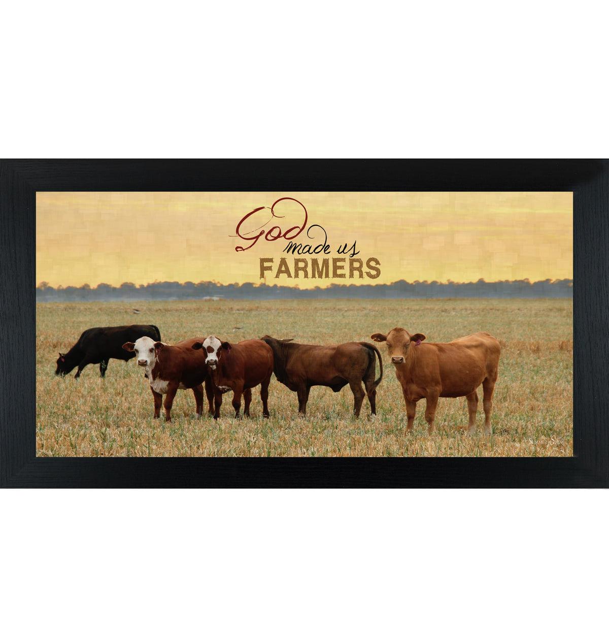 Black framed wide panoramic farmhouse wall art featuring cattle grazing in a golden sunset field with pallet wood background and the words God Made Us Farmers