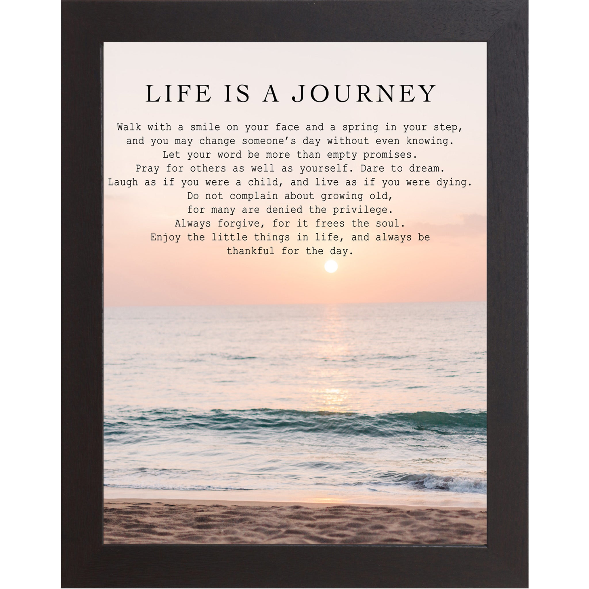 Black framed portrait inspirational wall art with the Life Is a Journey poem set against a soft peach and coral beach sunset with teal ocean waves and sandy shoreline