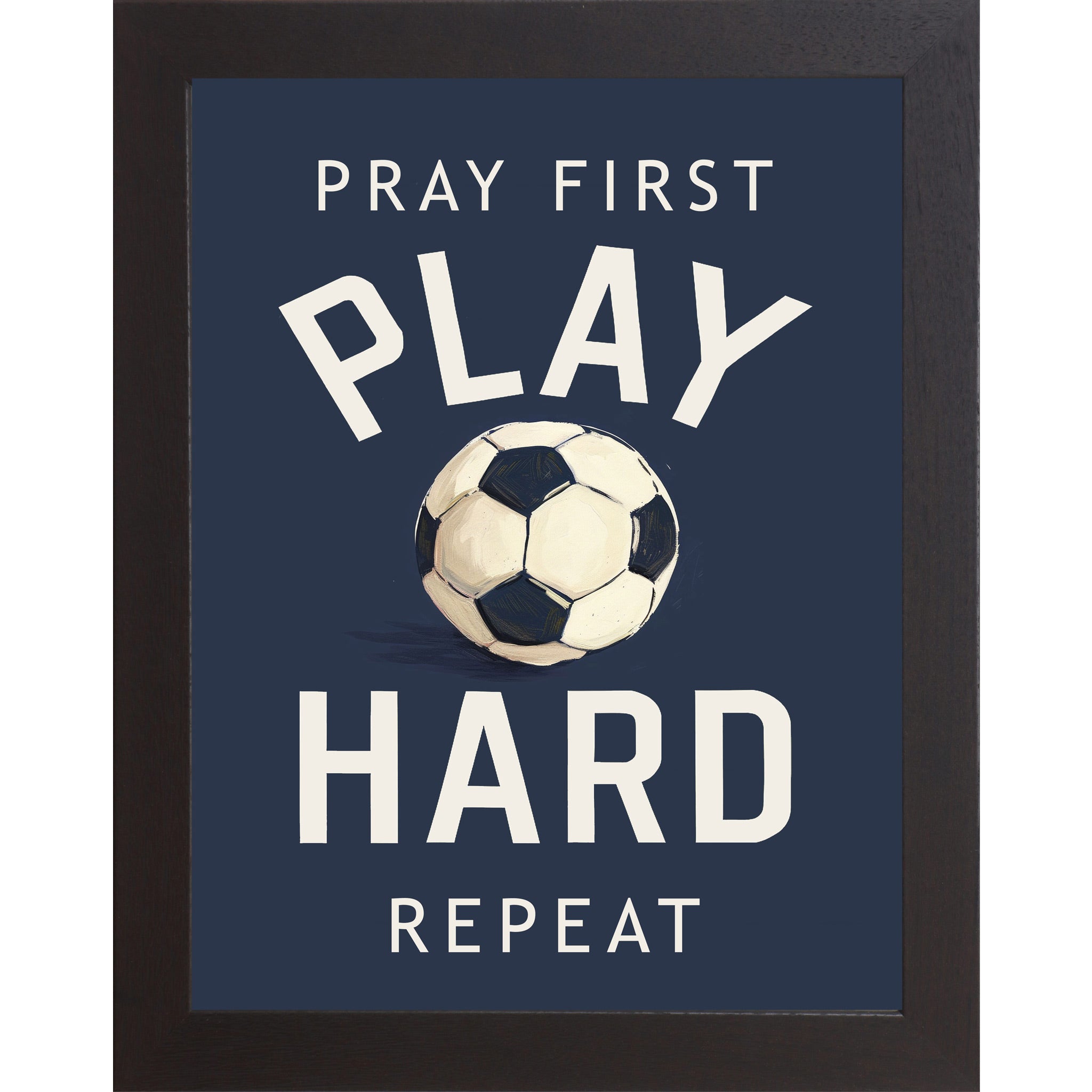Black framed portrait Christian soccer wall art on navy blue background with bold cream varsity typography and vivid watercolor soccer ball with the words Pray First Play Hard Repeat — SB261