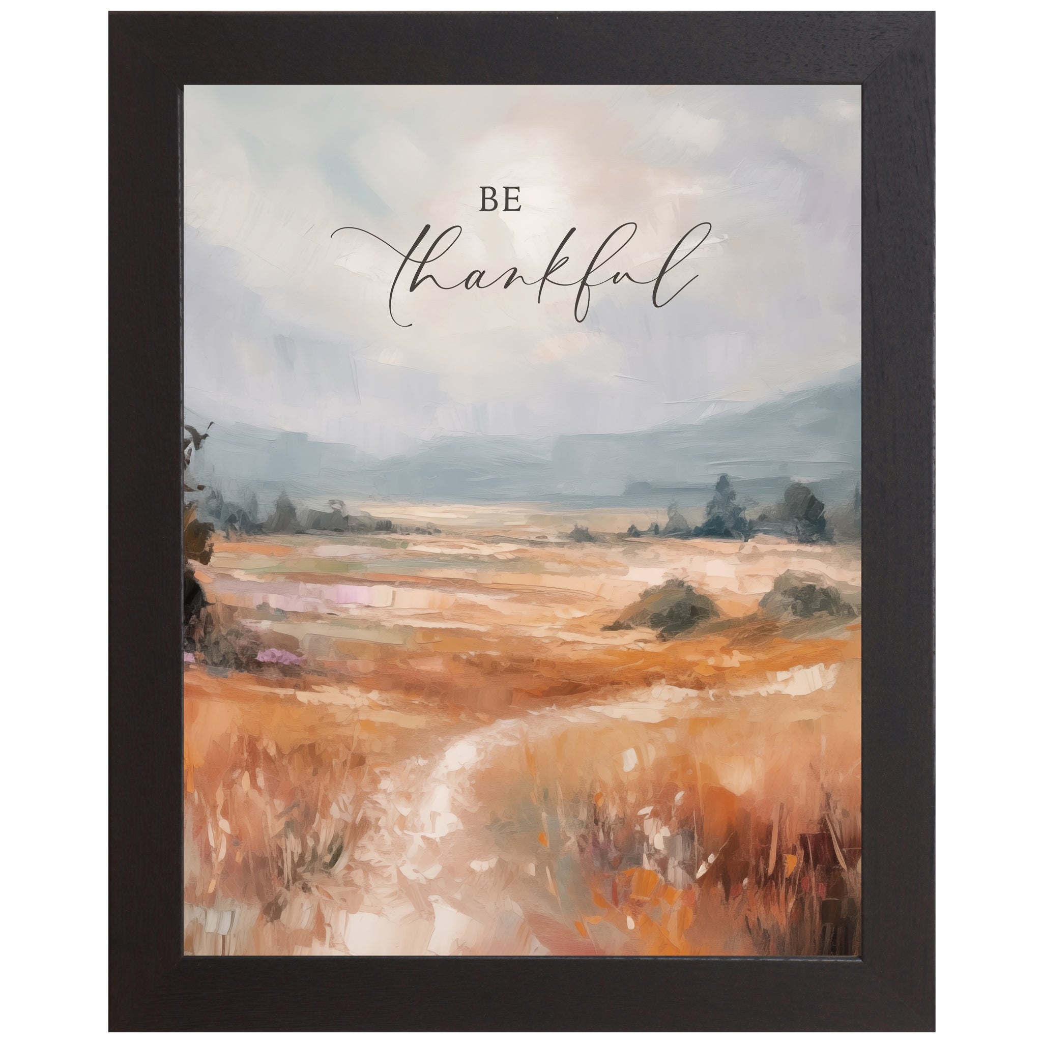Black framed portrait inspirational wall art with Be Thankful in elegant script over soft peach blush terracotta abstract painterly landscape with pale blue-grey sky