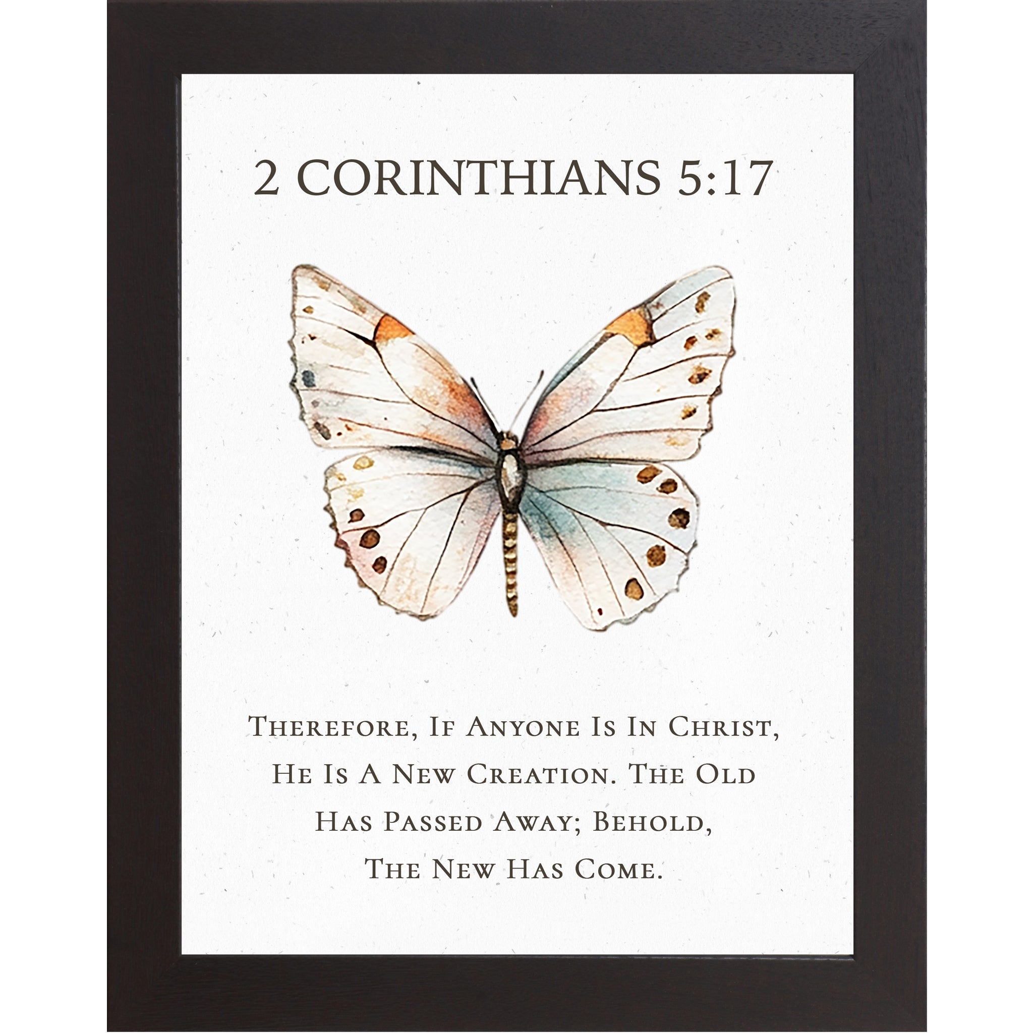 2 Corinthians 5:17 Christian butterfly wall art featuring a large watercolor butterfly on a neutral white background, framed scripture decor symbolizing new creation in Christ.