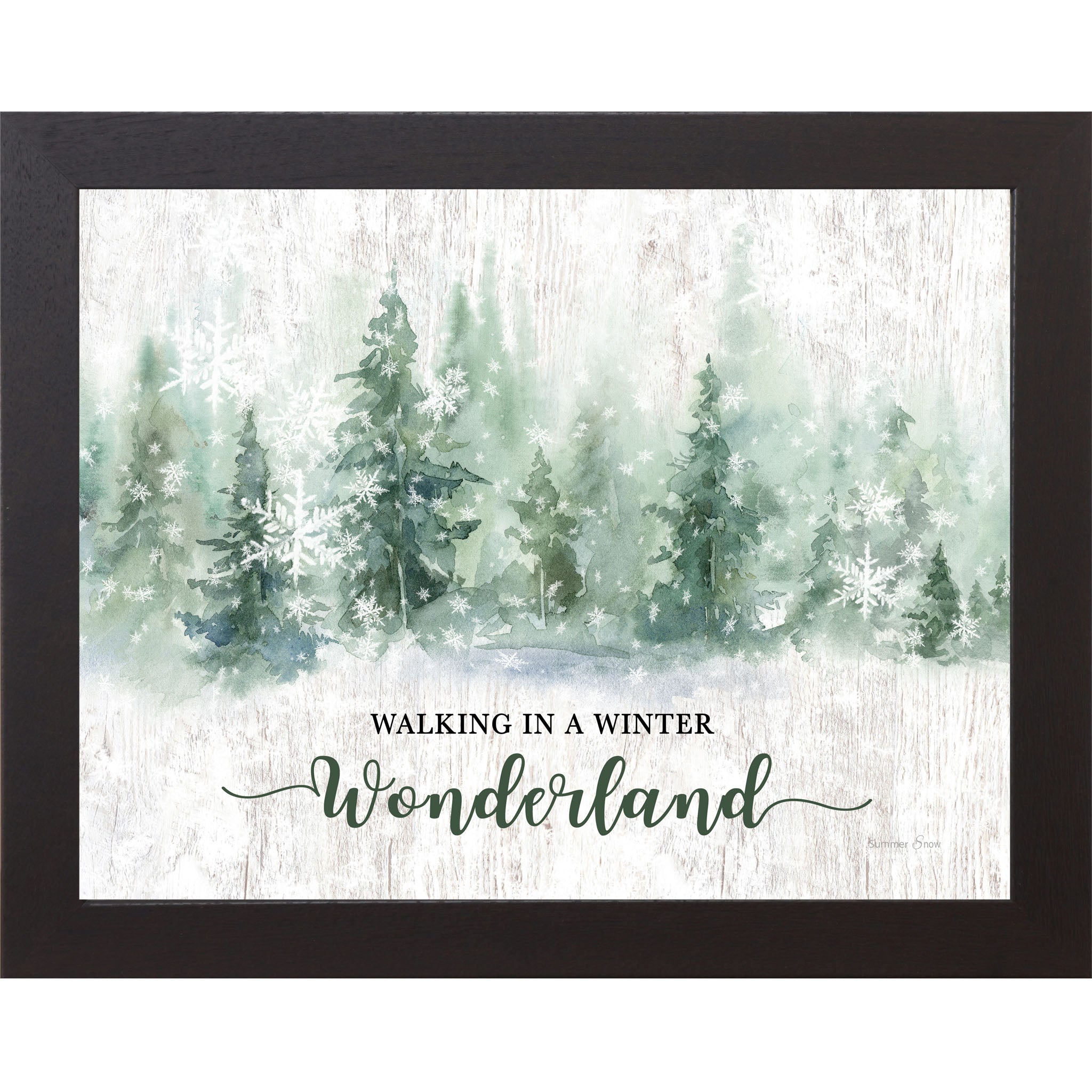 Black framed landscape watercolor winter wall art featuring snowy green pine trees and falling snowflakes with the words "Walking In A Winter Wonderland"