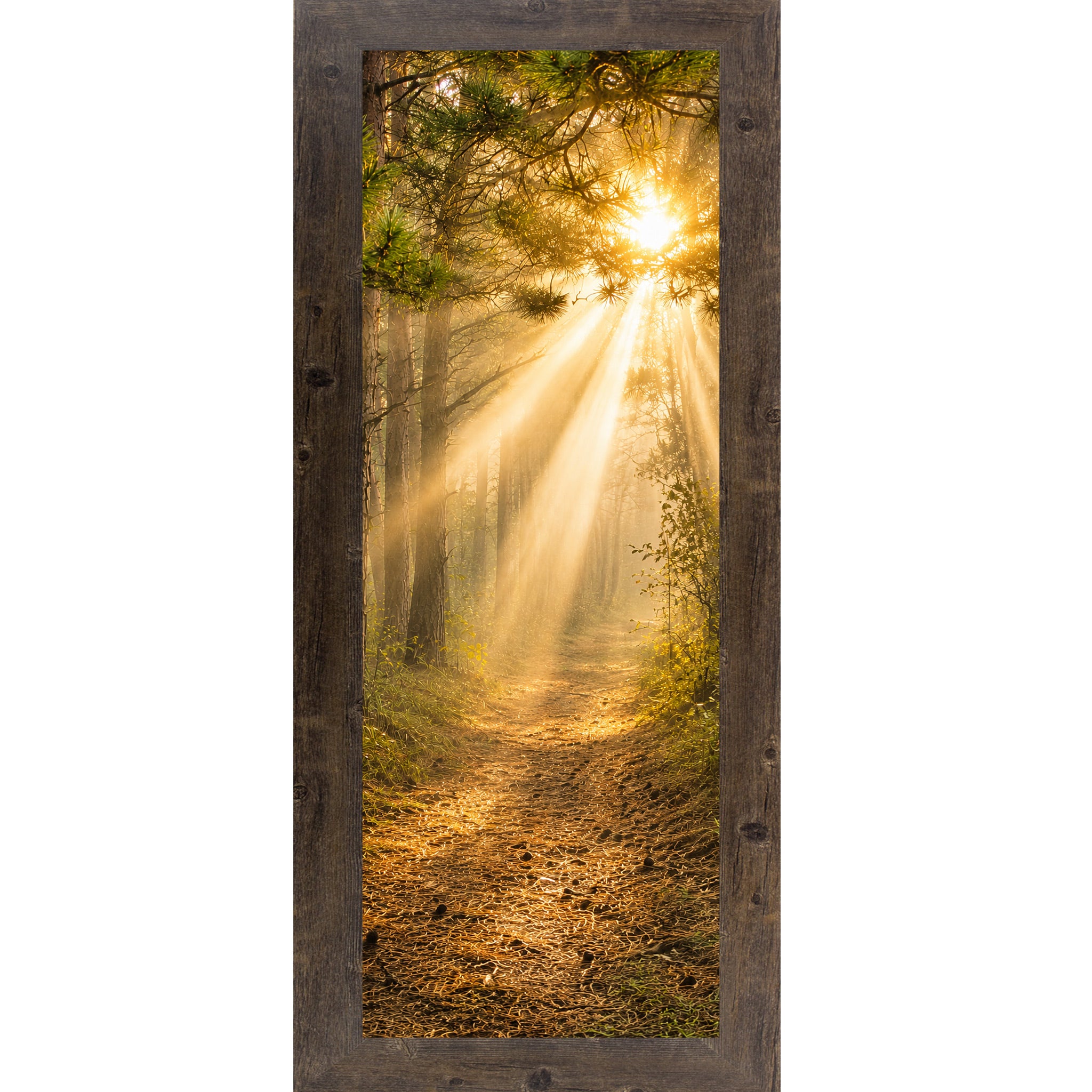 Natural Brown framed narrow portrait nature wall art featuring a divine forest path with golden sunlight rays streaming through pine tree canopy toward a glowing sun in warm sacred morning light