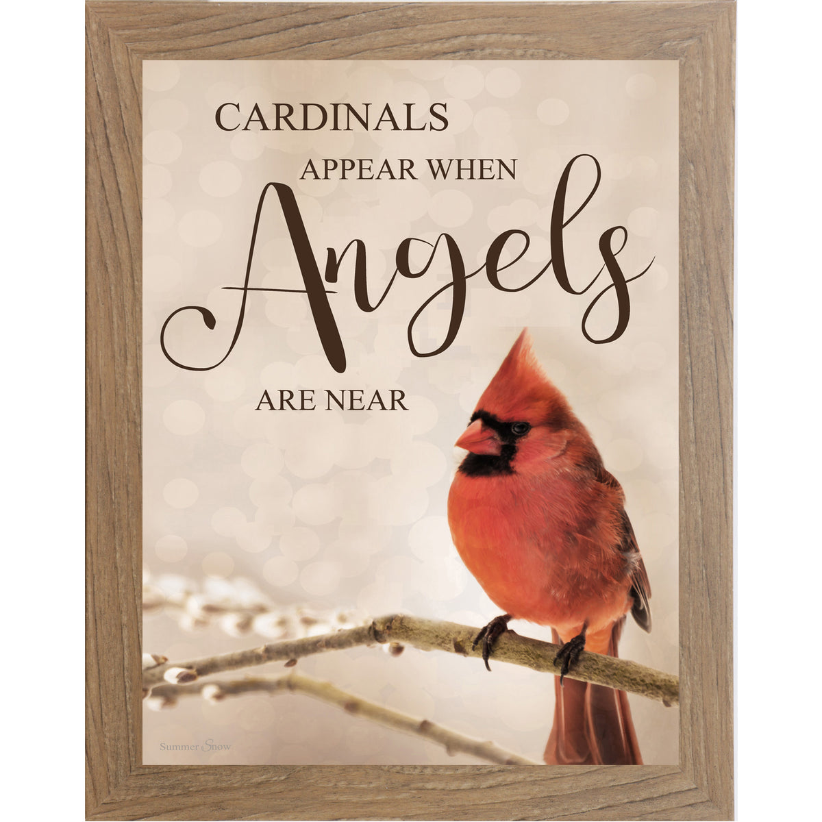 Vertical framed wall art featuring a red cardinal sitting on a branch with the words Cardinals Appear When Angels Are Near on a warm neutral background