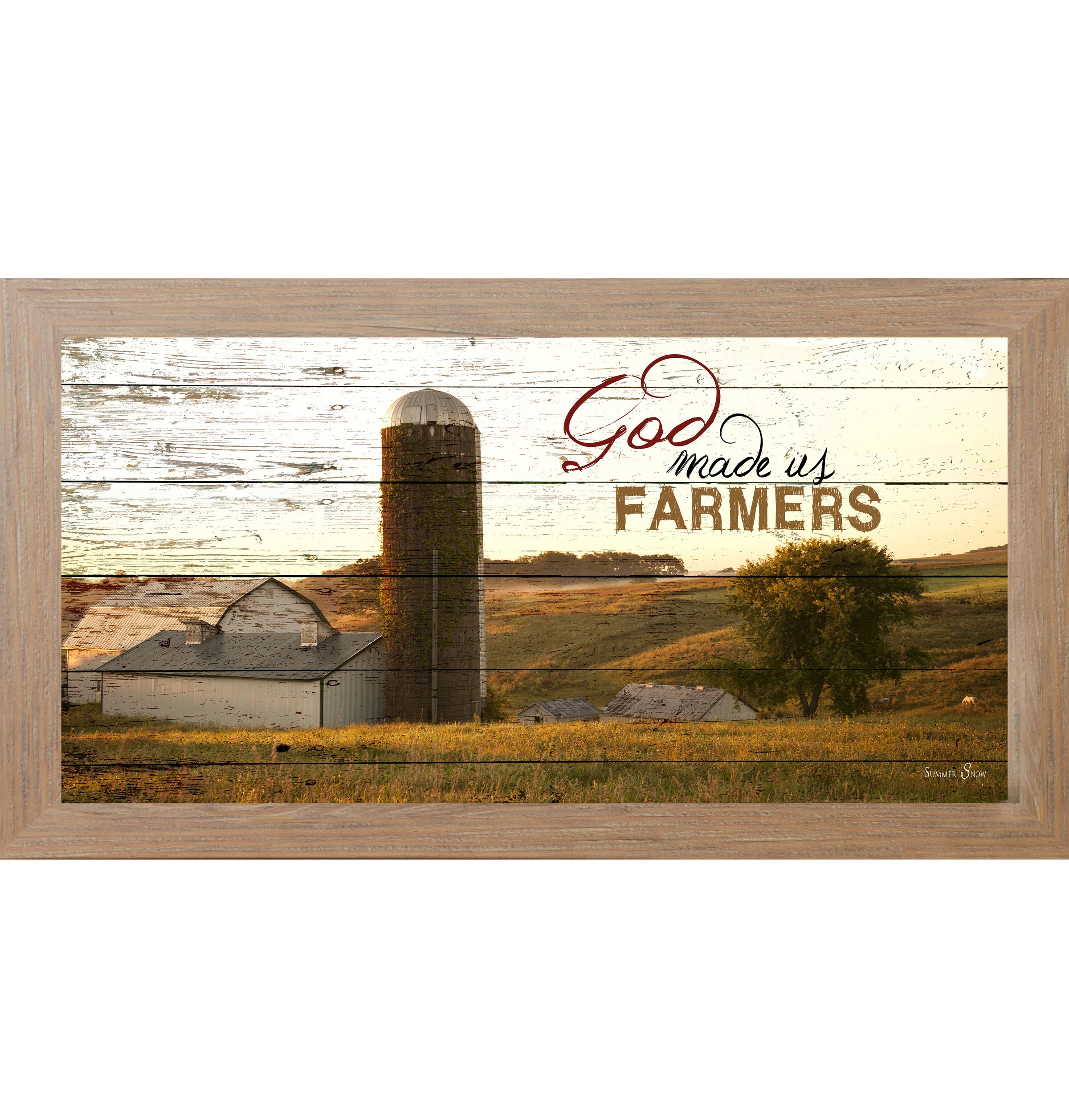Farmtable framed wide panoramic farmhouse wall art featuring a white barn and silo on rolling golden hills with pallet wood background and the words God Made Us Farmers