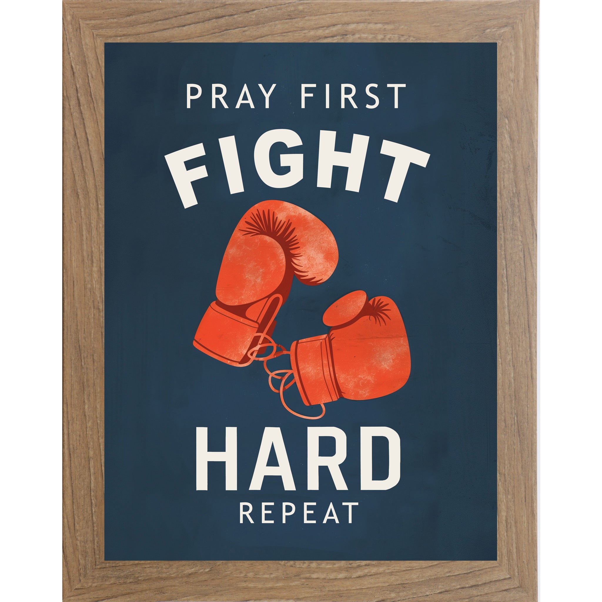 Farmtable framed portrait Christian boxing wall art on navy blue background with bold cream varsity typography and vivid red boxing gloves with the words Pray First Fight Hard Repeat — SB262