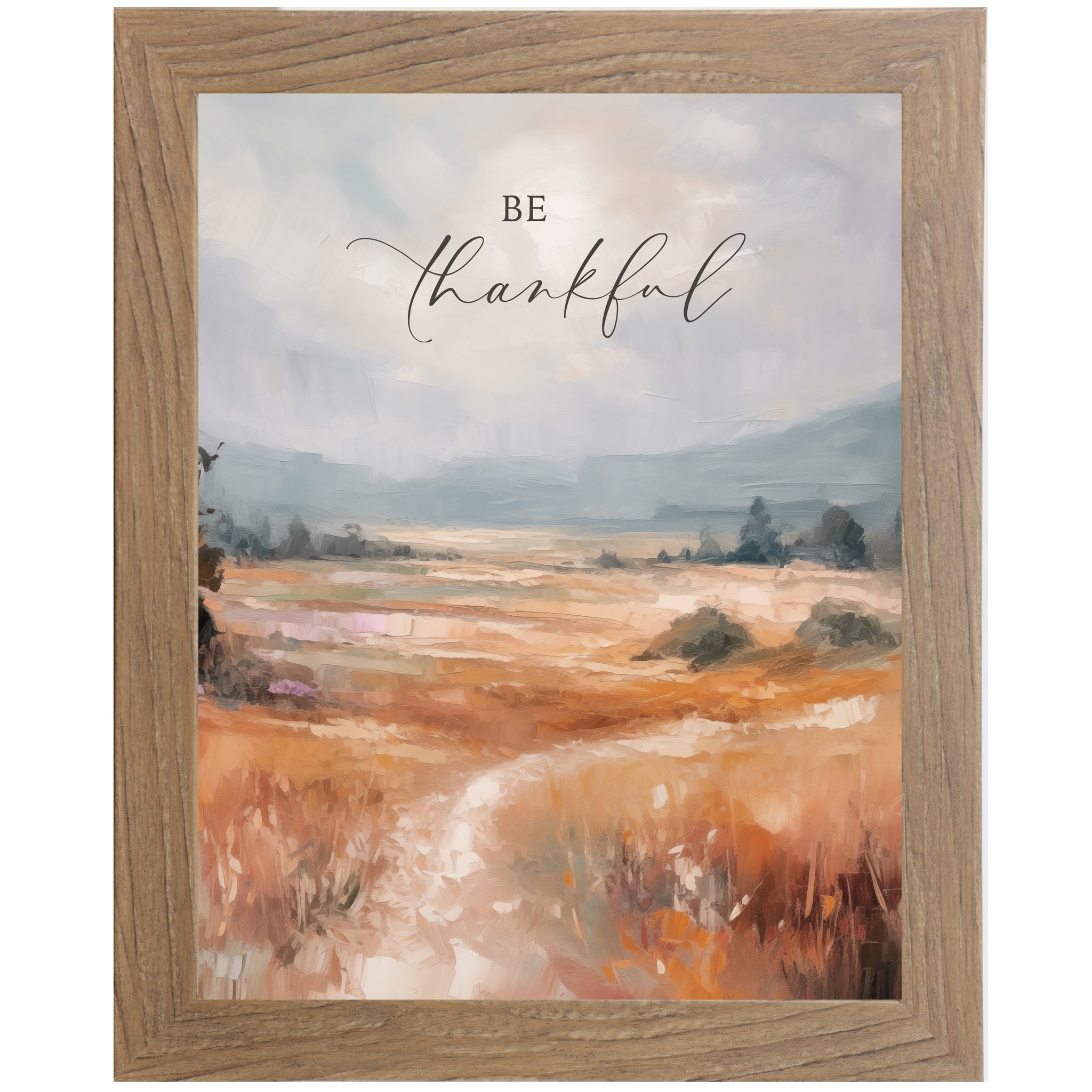 Farmtable framed portrait inspirational wall art with Be Thankful in elegant script over soft peach blush terracotta abstract painterly landscape with pale blue-grey sky