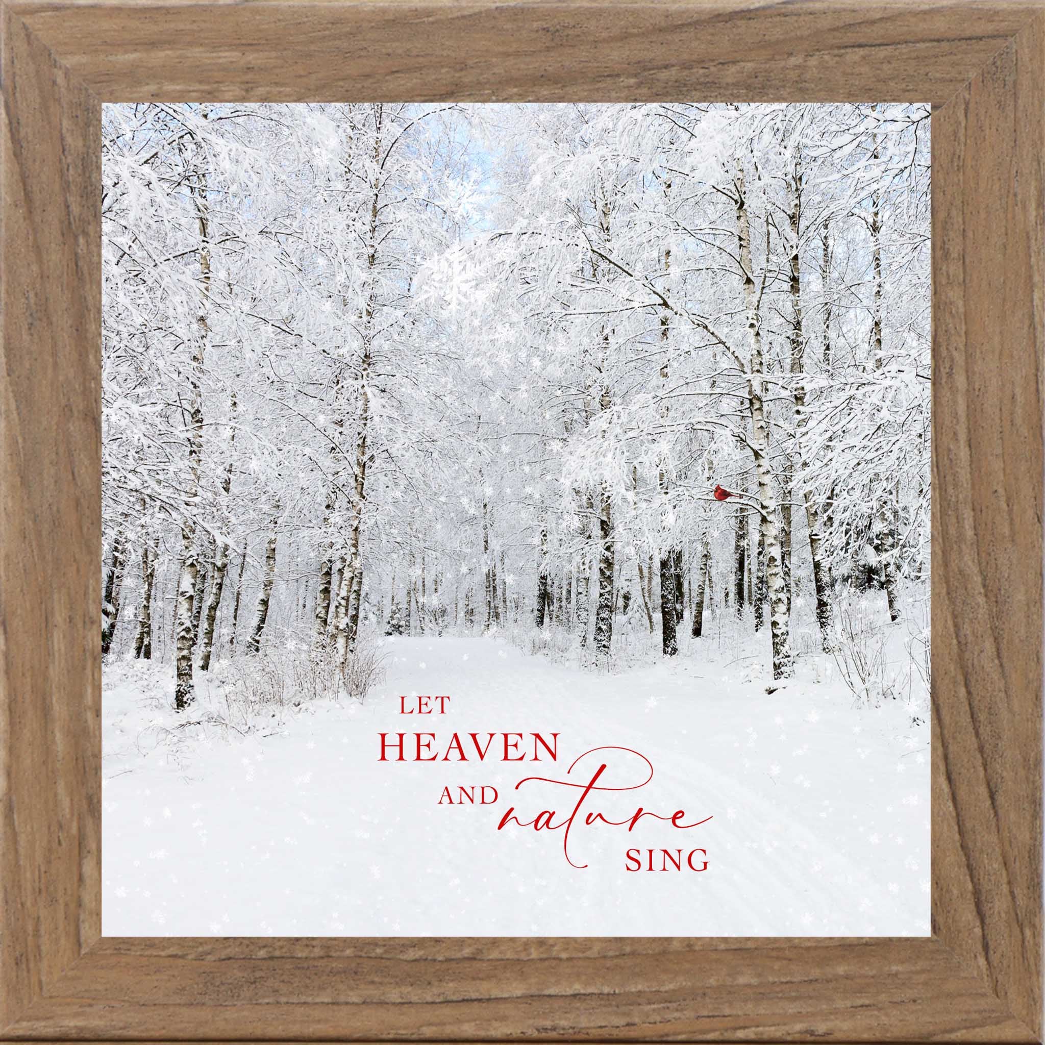 Let Heaven and Nature Sing Christmas wall art featuring snowy forest path with red cardinal and red holiday lettering, square winter framed decor