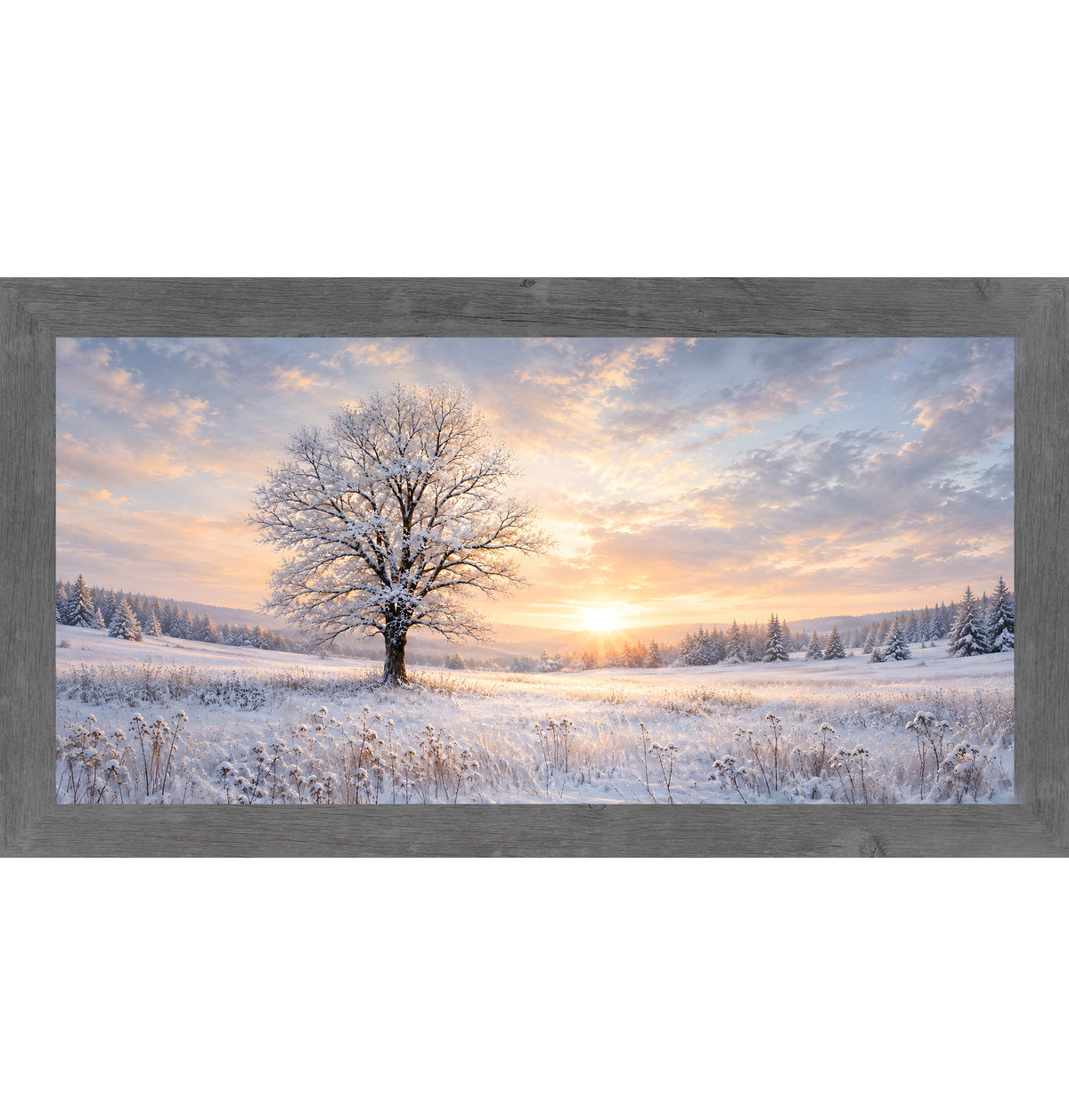 Gray framed wide panoramic winter wall art featuring a snow-dusted tree against a glowing sunset stretching across a snowy field