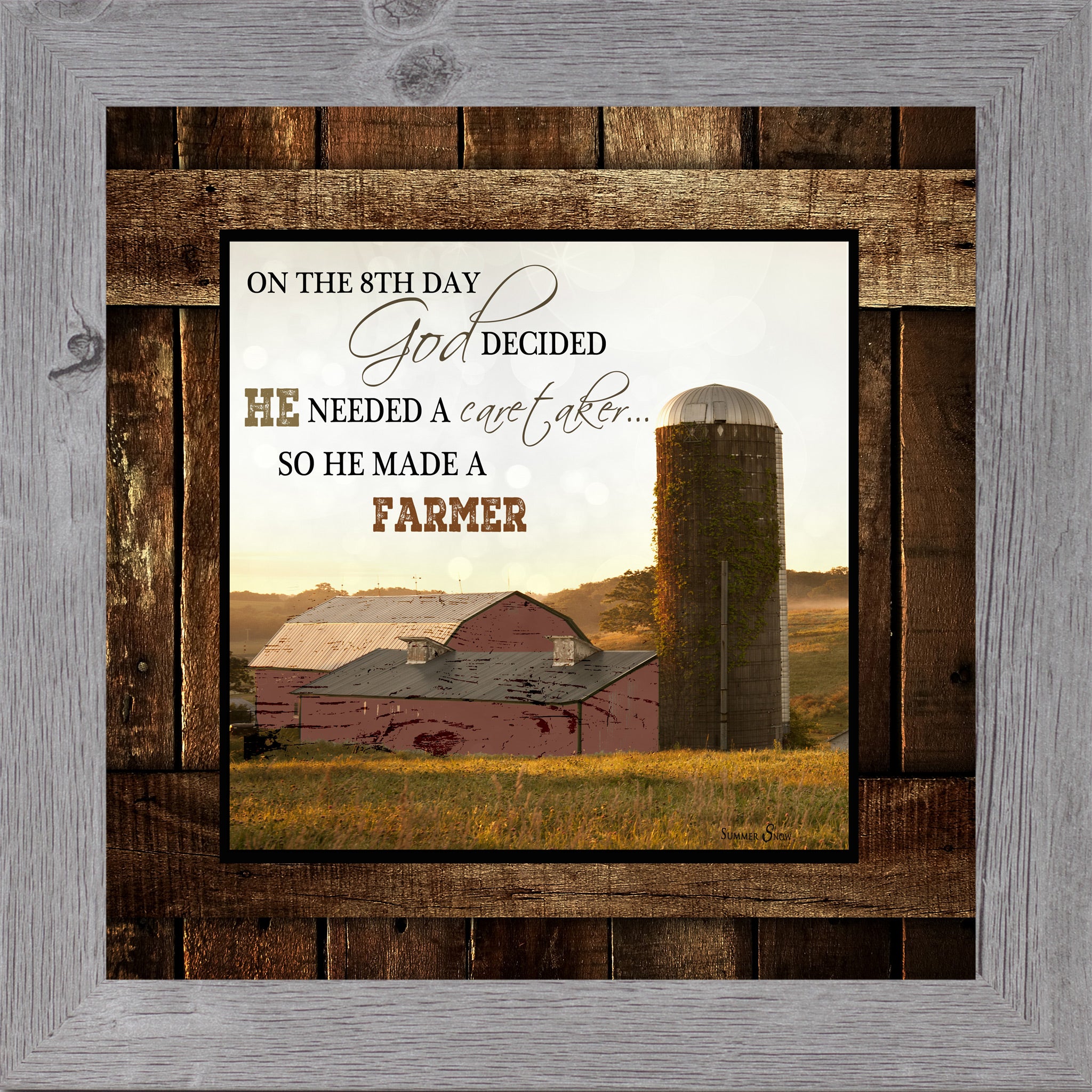 Gray framed square farmhouse wall art with On The 8th Day God Made A Farmer quote over red barn and ivy silo at golden sunrise on rustic barn wood background