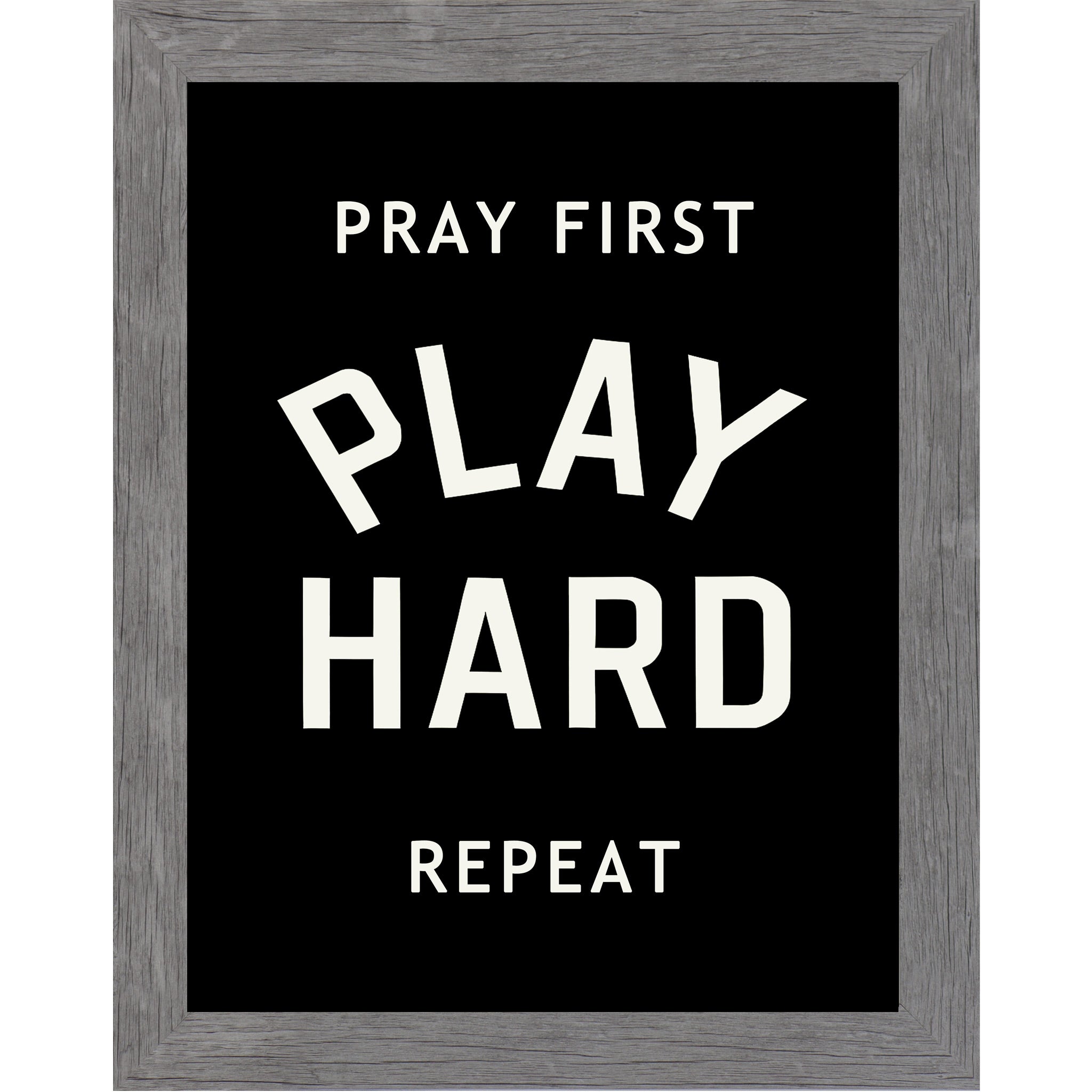 Gray framed vertical Christian wall art featuring Pray First Play Hard Repeat in bold cream athletic varsity typography on a pure black background