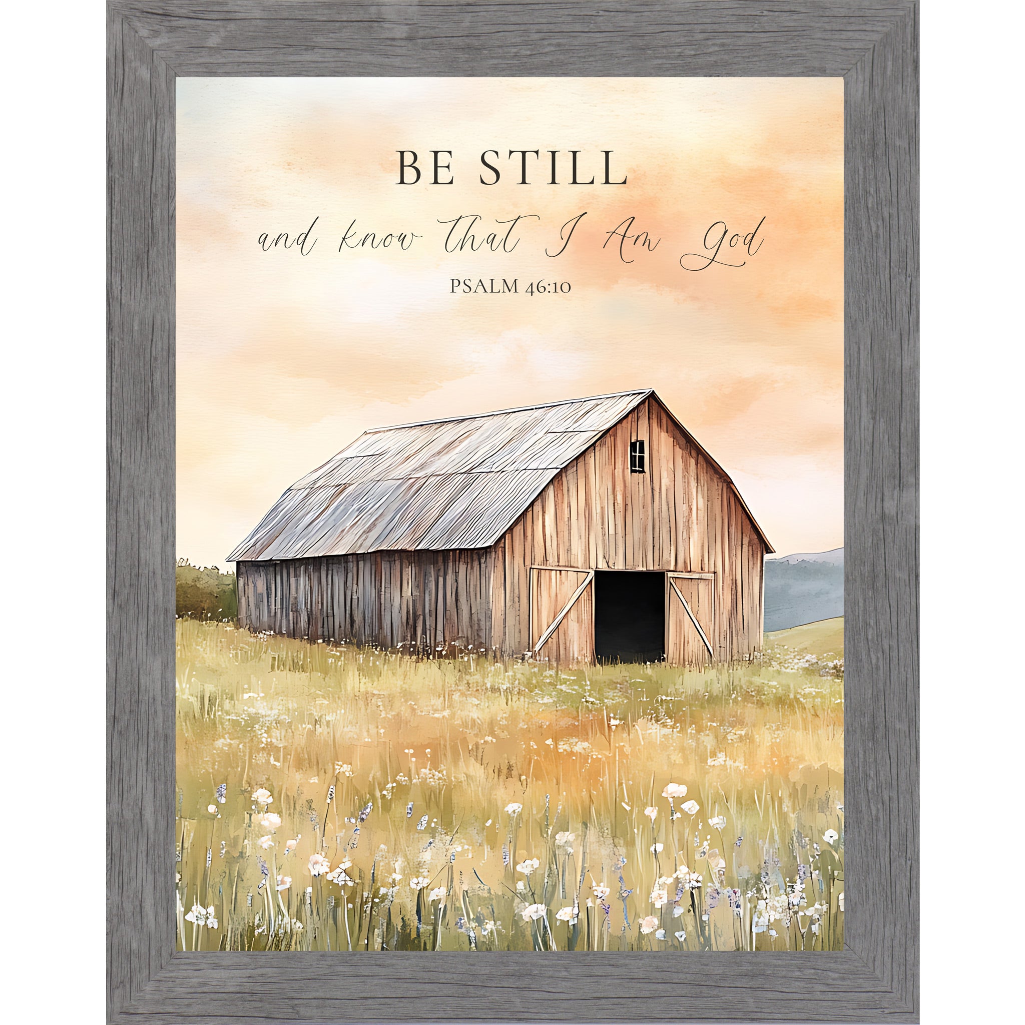 Gray framed portrait Christian wall art featuring watercolor farmhouse barn in golden wildflower meadow and peach sky with the words "Be Still and Know That I Am God Psalm 46:10" — SB255
