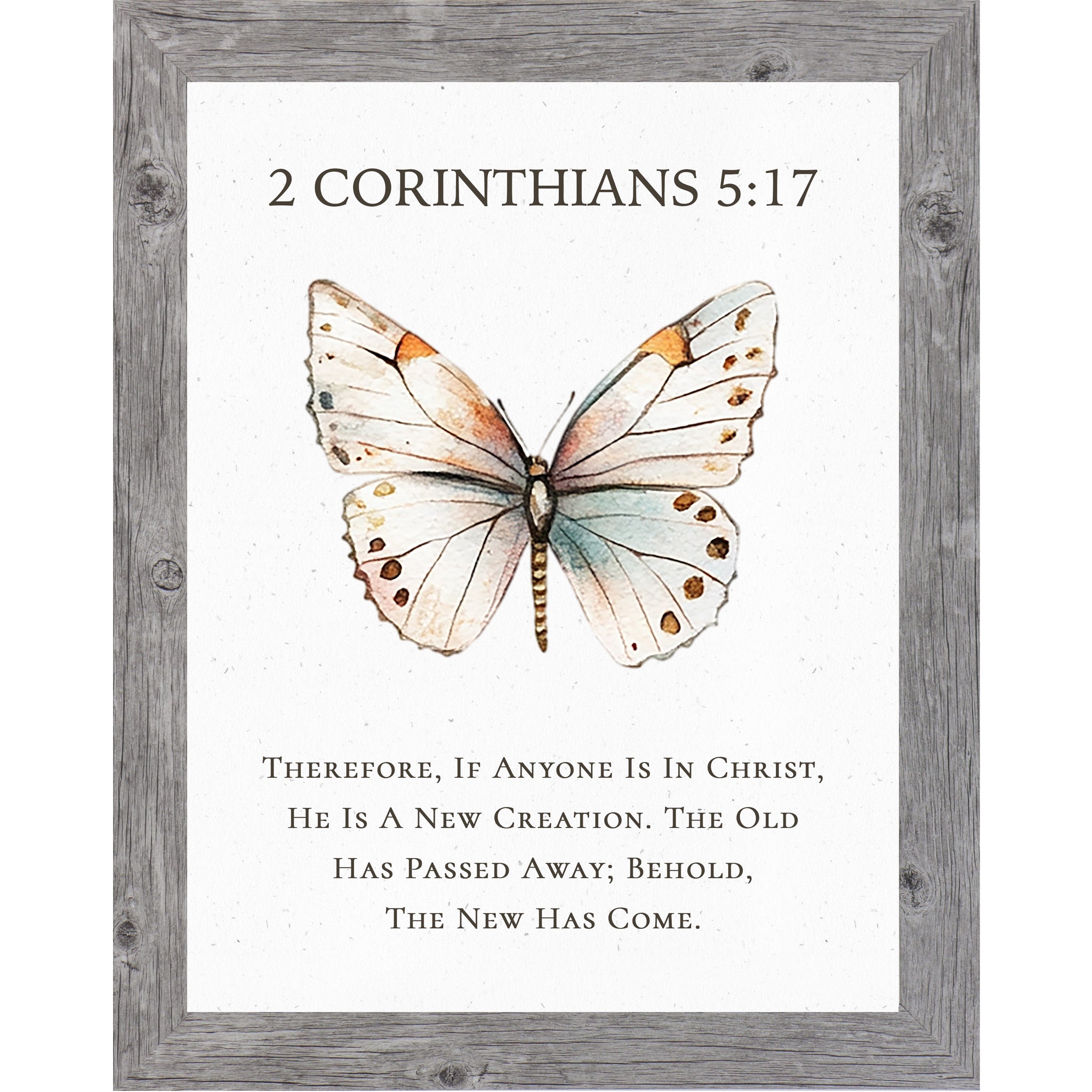 2 Corinthians 5:17 Christian butterfly wall art featuring a large watercolor butterfly on a neutral white background, framed scripture decor symbolizing new creation in Christ.
