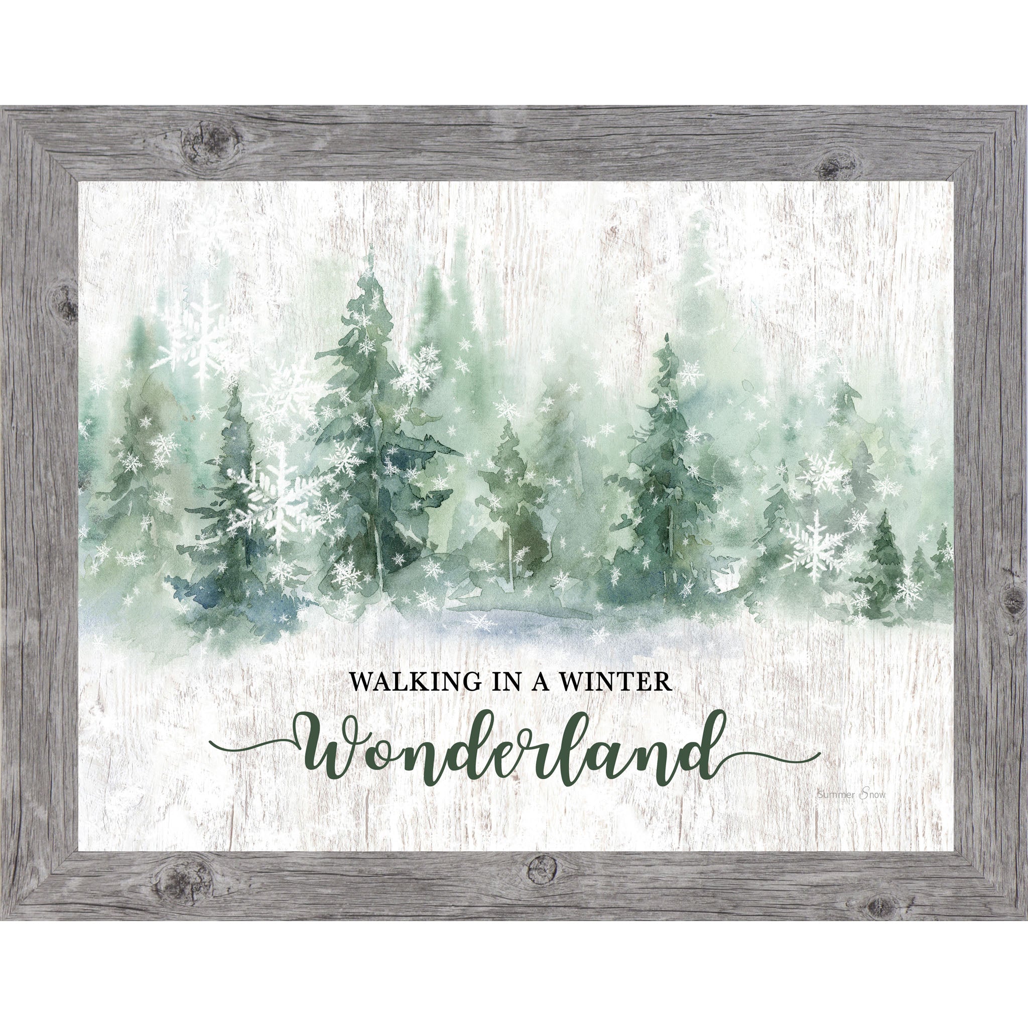 Gray framed landscape watercolor winter wall art featuring snowy green pine trees and falling snowflakes with the words "Walking In A Winter Wonderland"