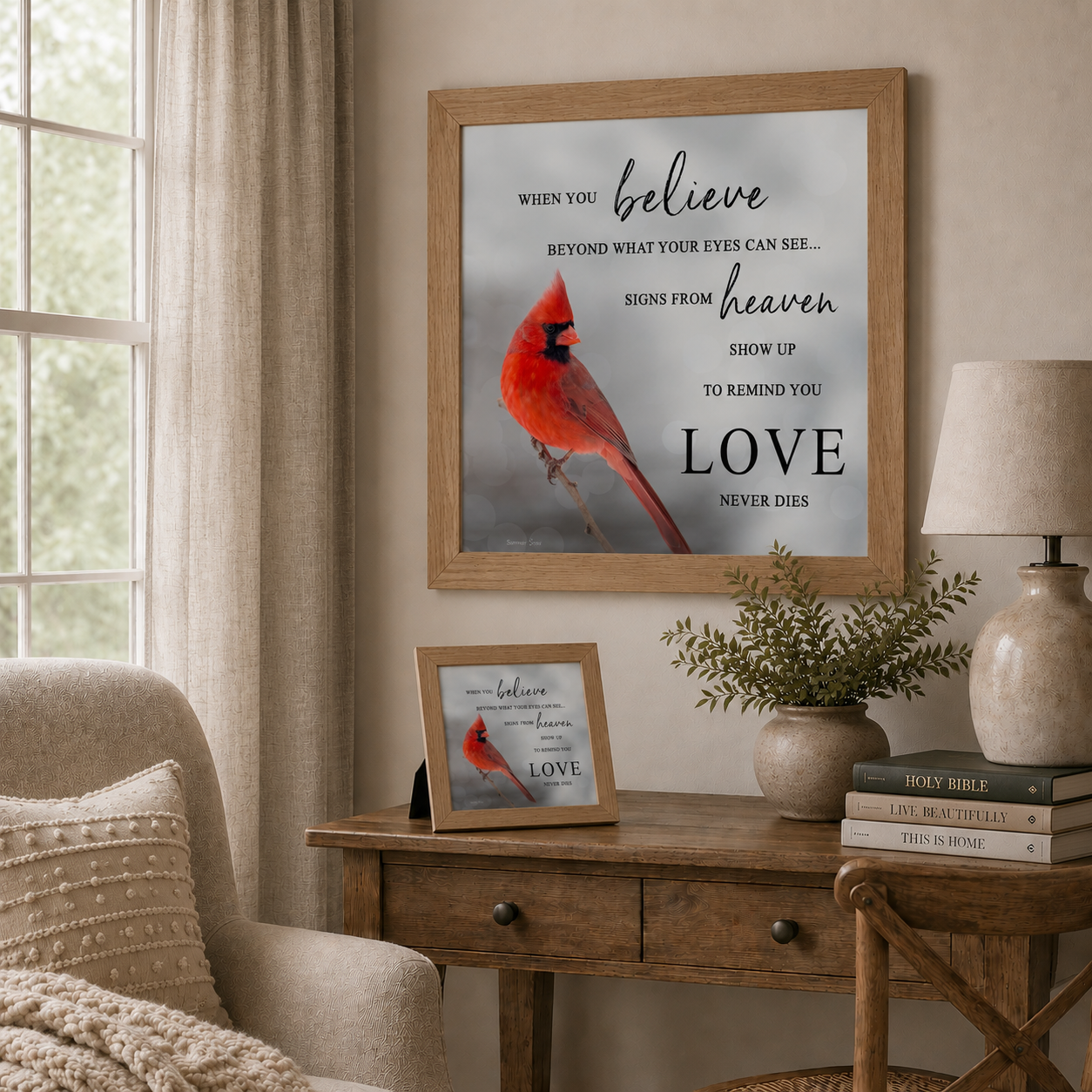 Soft neutral living room with When You Believe Love Never Dies wall art SA26 in farmtable frame — 20x20 hanging on wall and 8x8 easel back on wooden desk beside Holy Bible Live Beautifully and This Is Home books and greenery