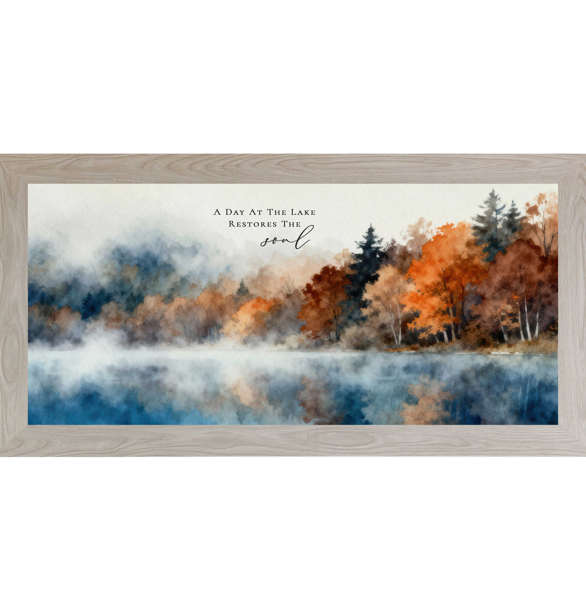 Framed lake wall art featuring calm blue water reflecting autumn trees with the quote “A Day At The Lake Restores The Soul,” wide horizontal watercolor nature decor.