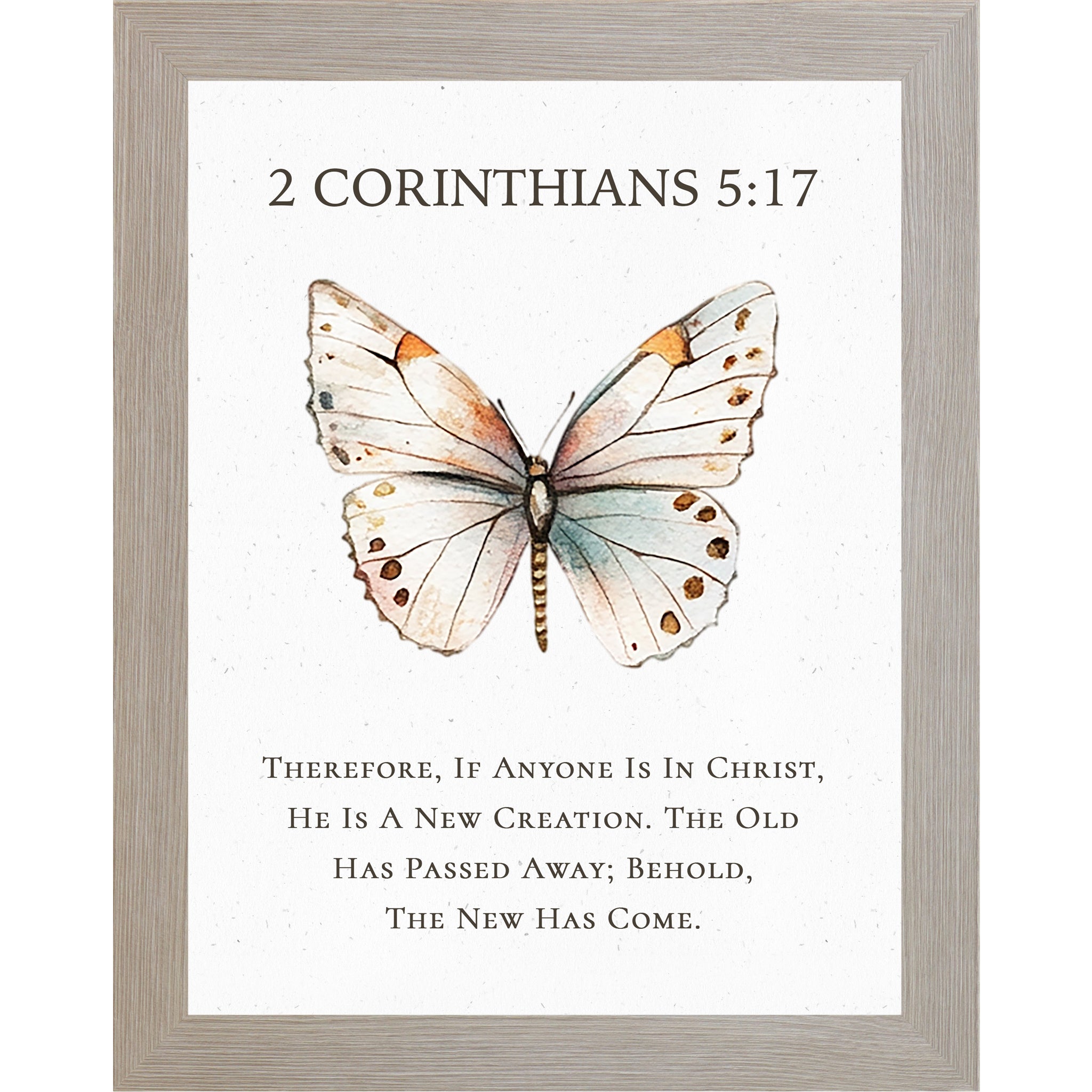 2 Corinthians 5:17 Christian butterfly wall art featuring a large watercolor butterfly on a neutral white background, framed scripture decor symbolizing new creation in Christ.