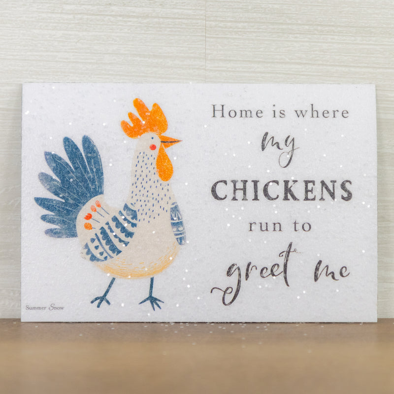 Home Is Where My Chickens Run To Greet Me magnet – 4x6 horizontal whimsical cartoon chicken with patterned blue feathers, orange head, and stick legs, glittered finish
