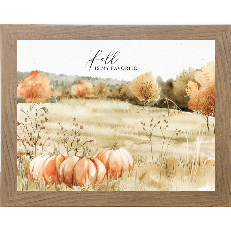 Framed fall watercolor art with two pumpkins in a grassy field, colorful trees, and the quote “Fall Is My Favorite”