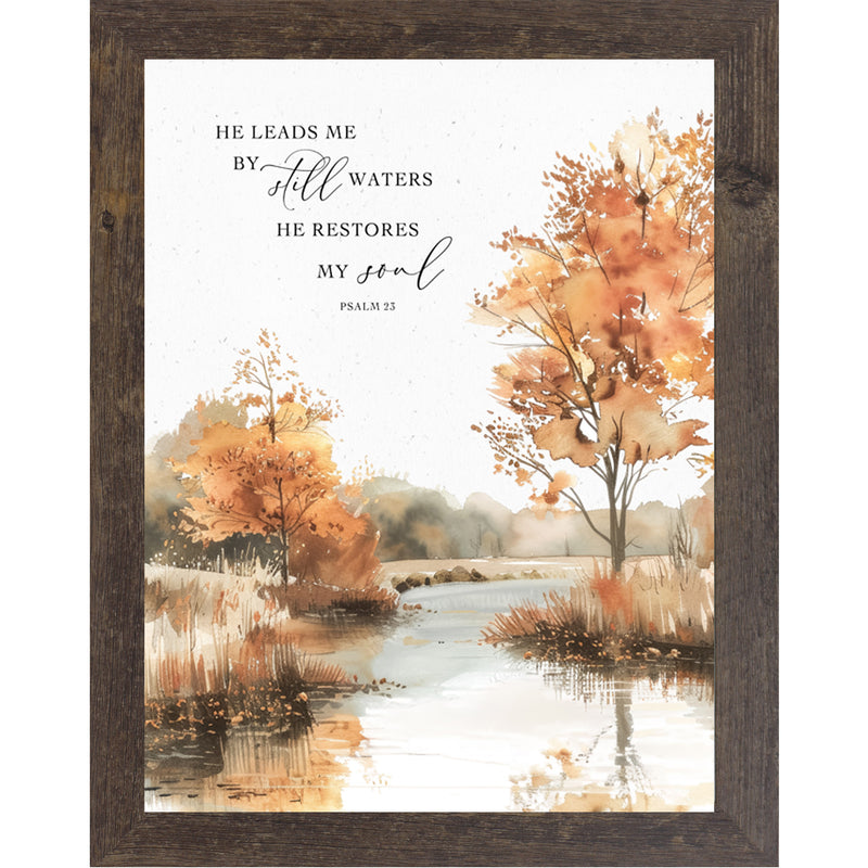 Framed fall river scene with autumn trees, brown grass, and Psalm 23 quote “He leads me by still waters, He restores my soul”