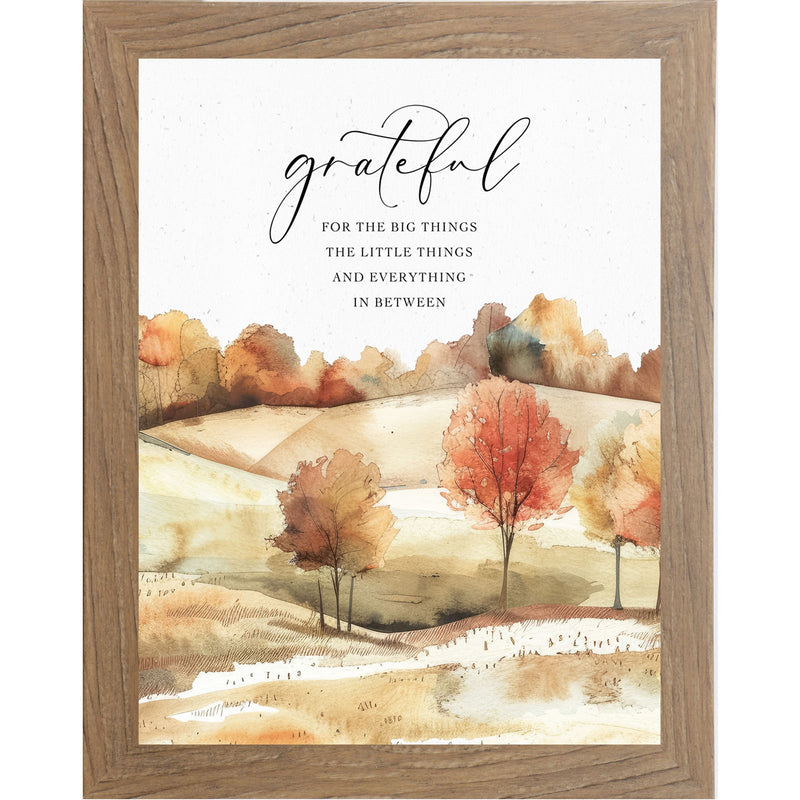 Framed fall watercolor wall art with colorful trees, brown hills, and the quote “Grateful for the big things and little things”
