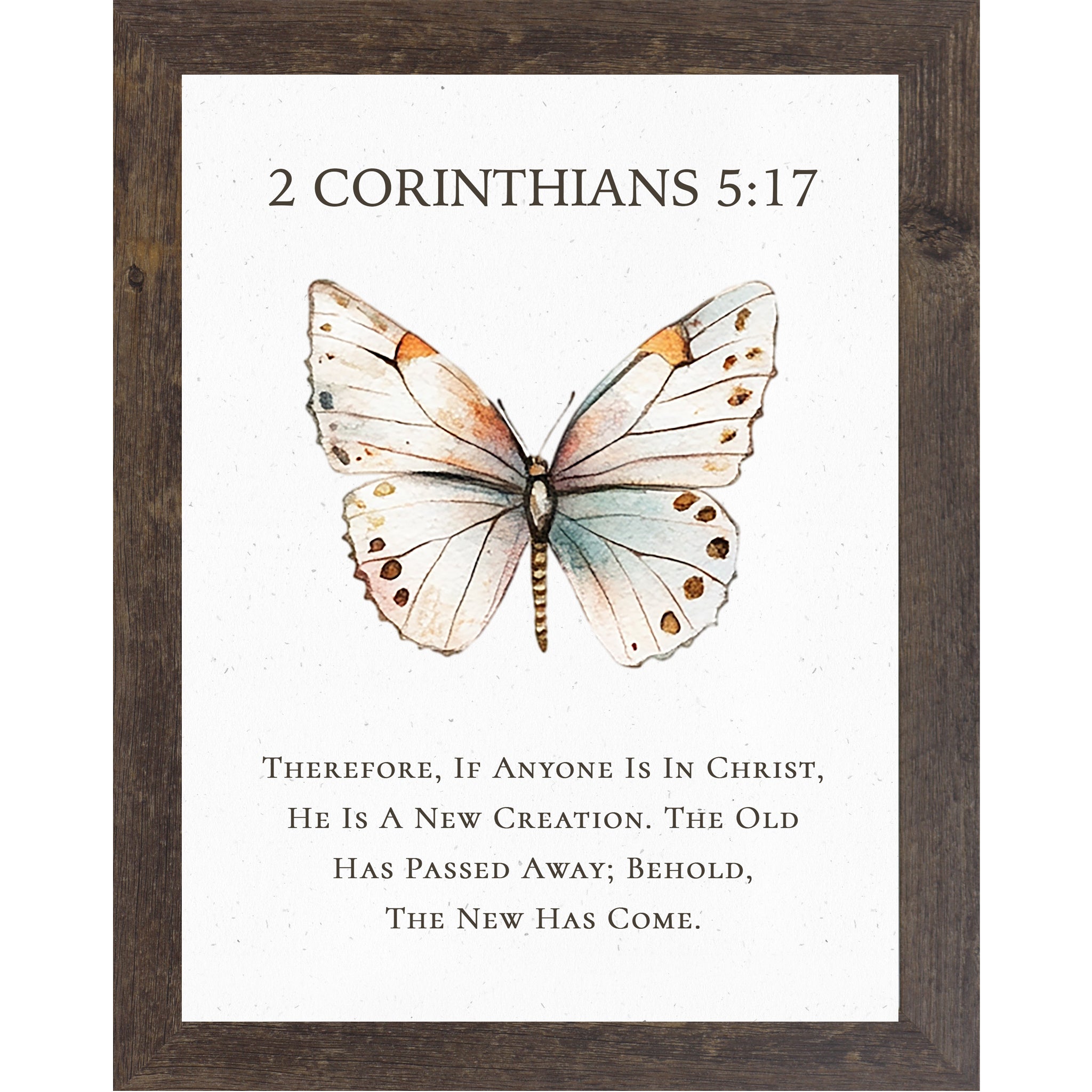 2 Corinthians 5:17 Christian butterfly wall art featuring a large watercolor butterfly on a neutral white background, framed scripture decor symbolizing new creation in Christ.