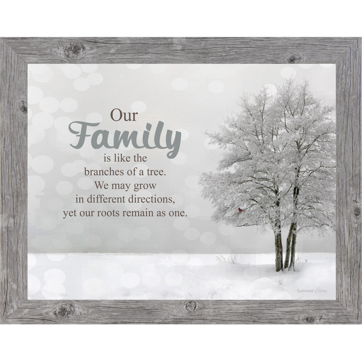 Framed winter wall art featuring a snowy forest scene with the quote “Our family is like the branches of a tree, we may grow in different directions yet our roots remain as one.”