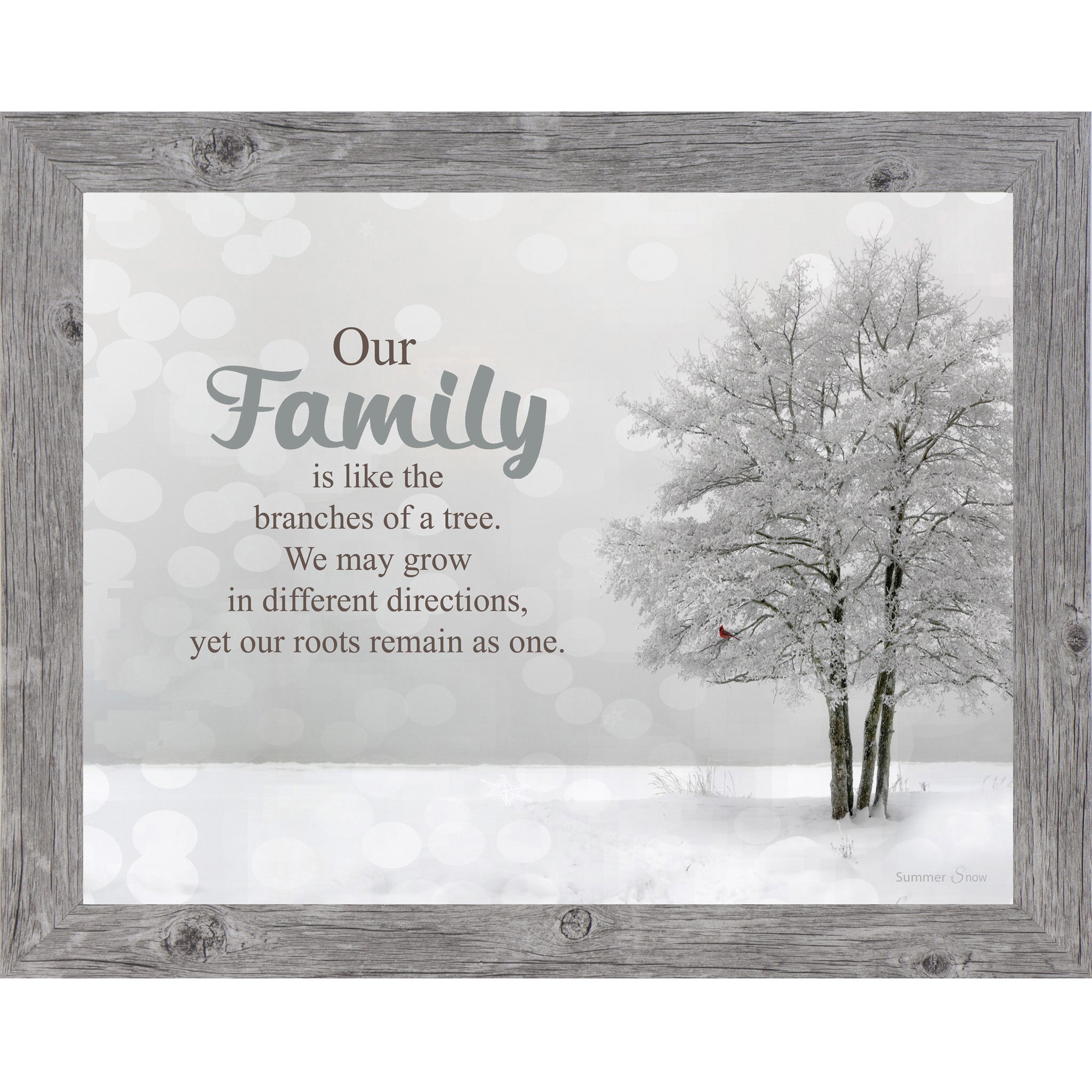 Framed winter wall art featuring a snowy forest scene with the quote “Our family is like the branches of a tree, we may grow in different directions yet our roots remain as one.”