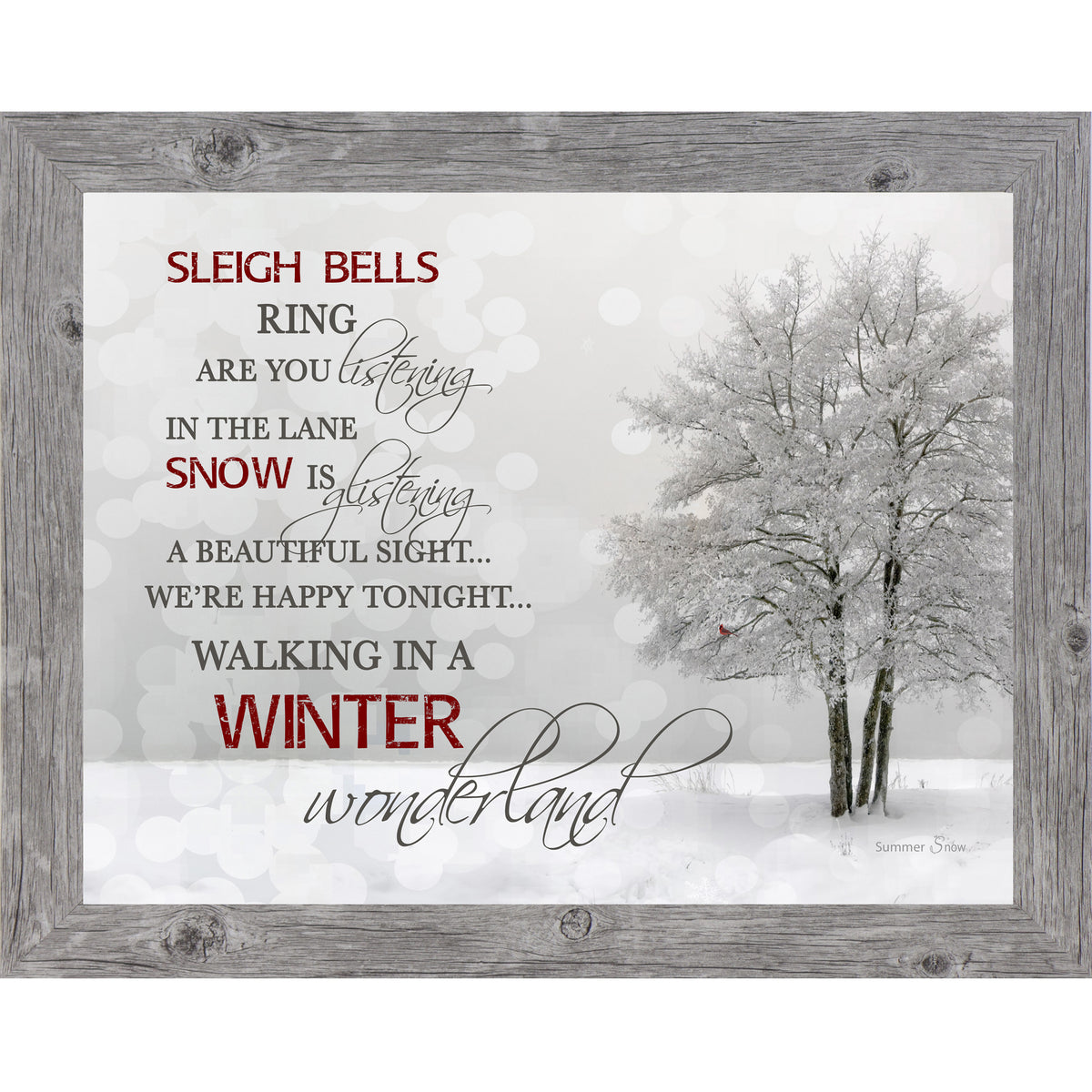 Framed winter scene with snow-covered tree, snowy field, and full lyrics to “Walking in a Winter Wonderland” on a neutral background