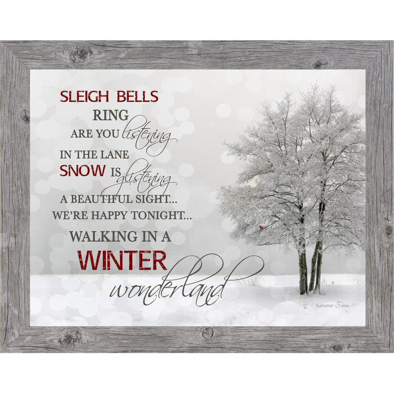 Framed winter scene with snow-covered tree, snowy field, and full lyrics to “Walking in a Winter Wonderland” on a neutral background