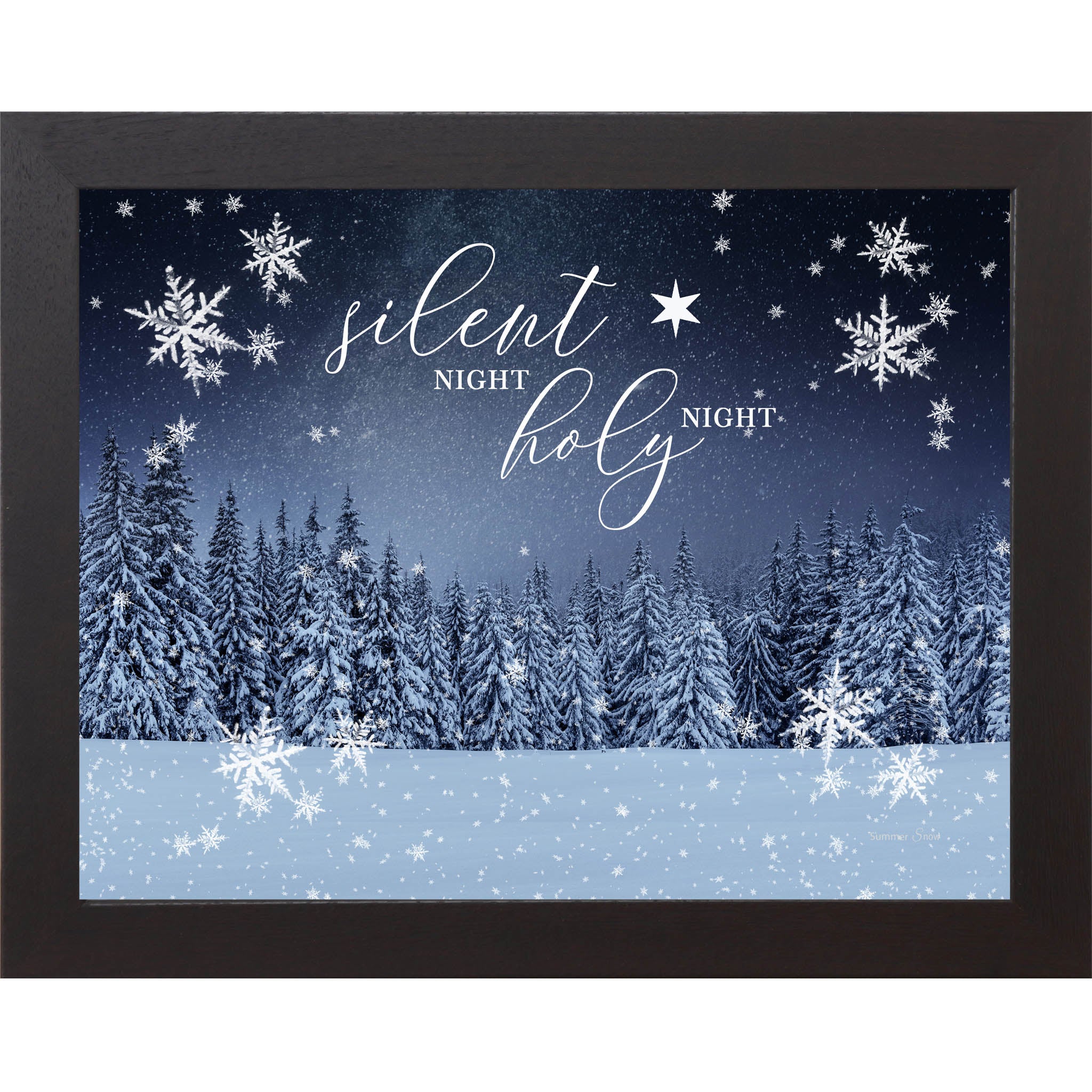 Framed Christmas wall art with the words “Silent Night, Holy Night” over a snowy winter night scene featuring evergreen trees, falling snow, and subtle snowflake details.