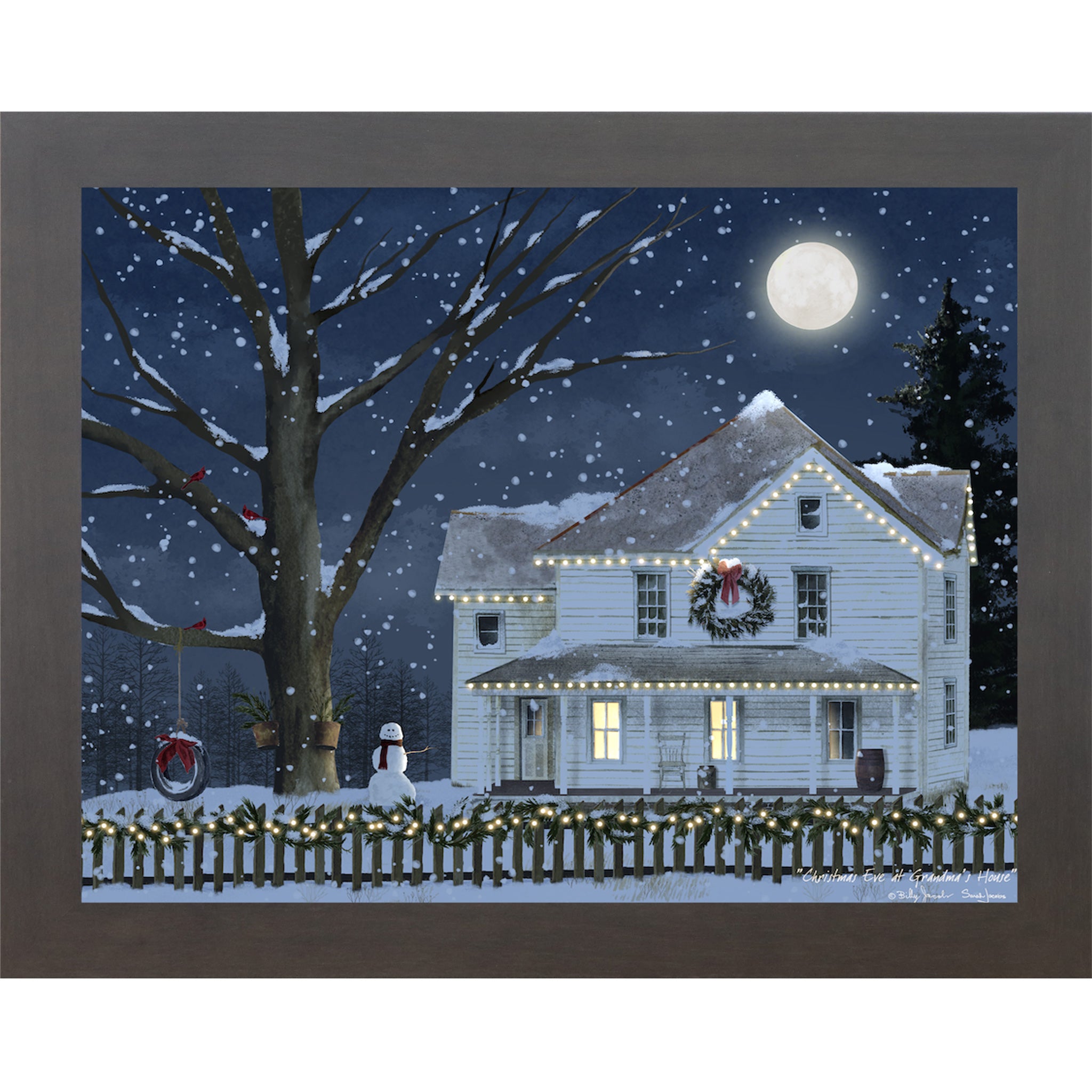 Slatewood framed Billy Jacobs Christmas Eve at Grandma's House wall art featuring a glowing white farmhouse with string lights wreath and snowman under a full moon in a midnight blue snowy sky with cardinals in a bare tree
