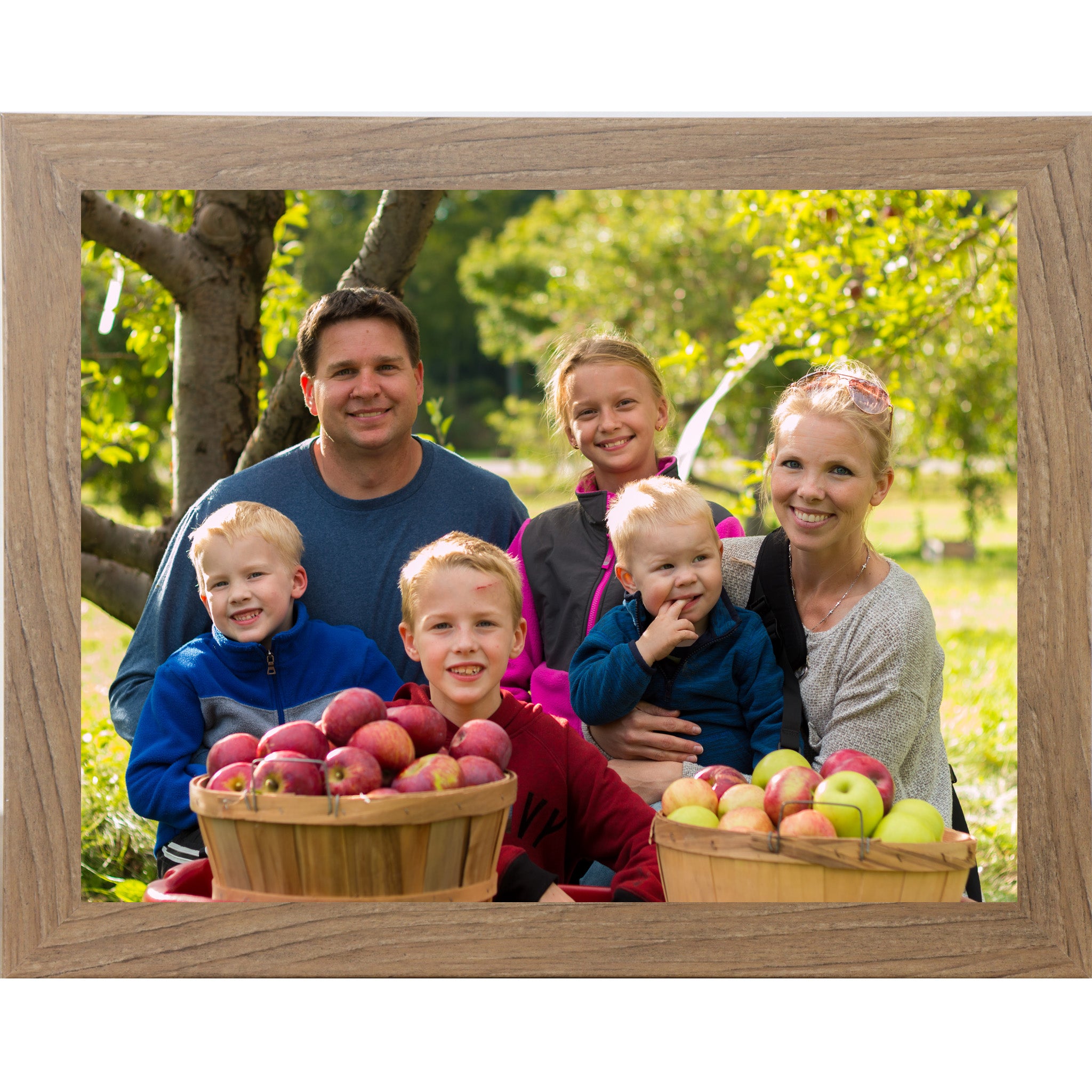 Farmtable framed horizontal custom photo print showing a professionally framed family photograph in a farmtable 1 inch MDF frame with canvas finish