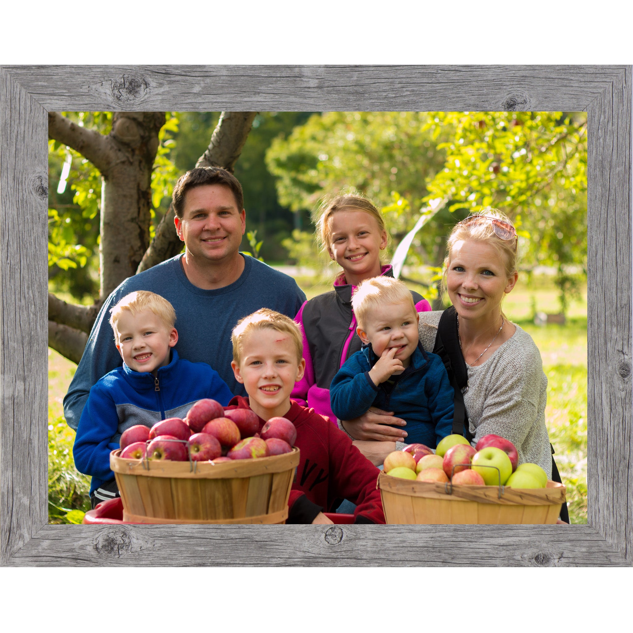 Gray framed horizontal custom photo print showing a professionally framed family photograph in a gray 1 inch MDF frame with canvas finish