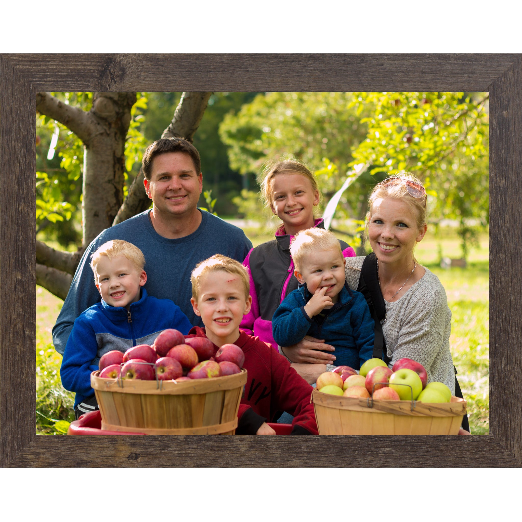 Natural brown framed horizontal custom photo print showing a professionally framed family photograph in a natural brown 1 inch MDF frame with canvas finish