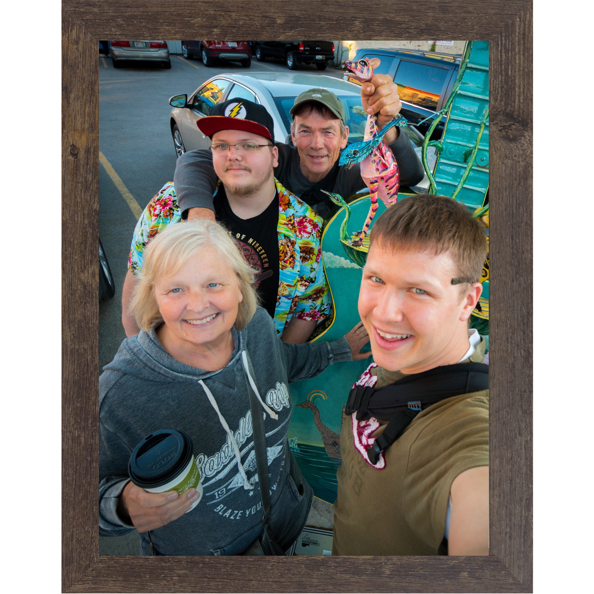 Natural brown framed vertical custom photo print showing a professionally framed family photograph in a natural brown 1 inch MDF frame with canvas finish