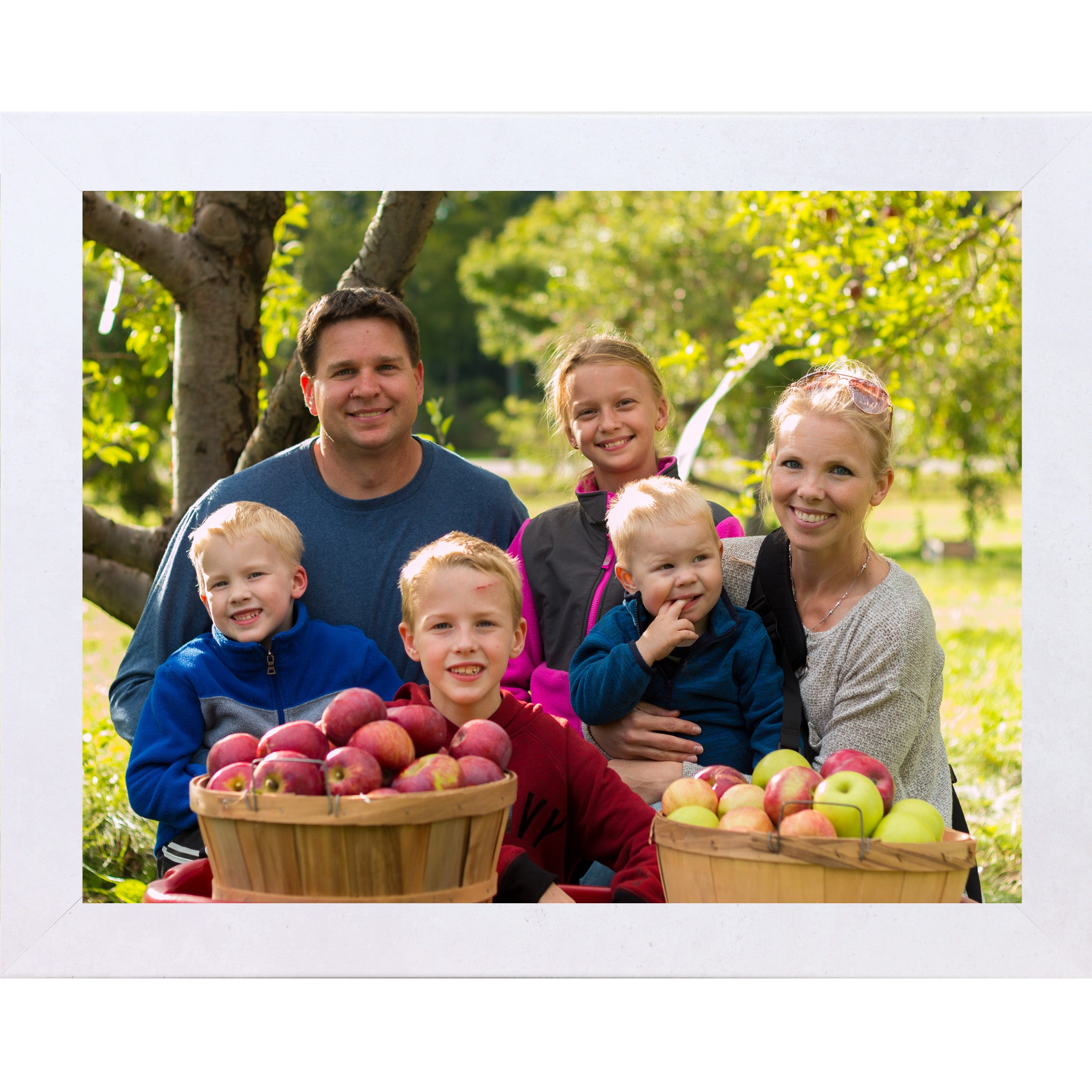 Terracotta white framed horizontal custom photo print showing a professionally framed family photograph in a terracotta white 1 inch MDF frame with canvas finish