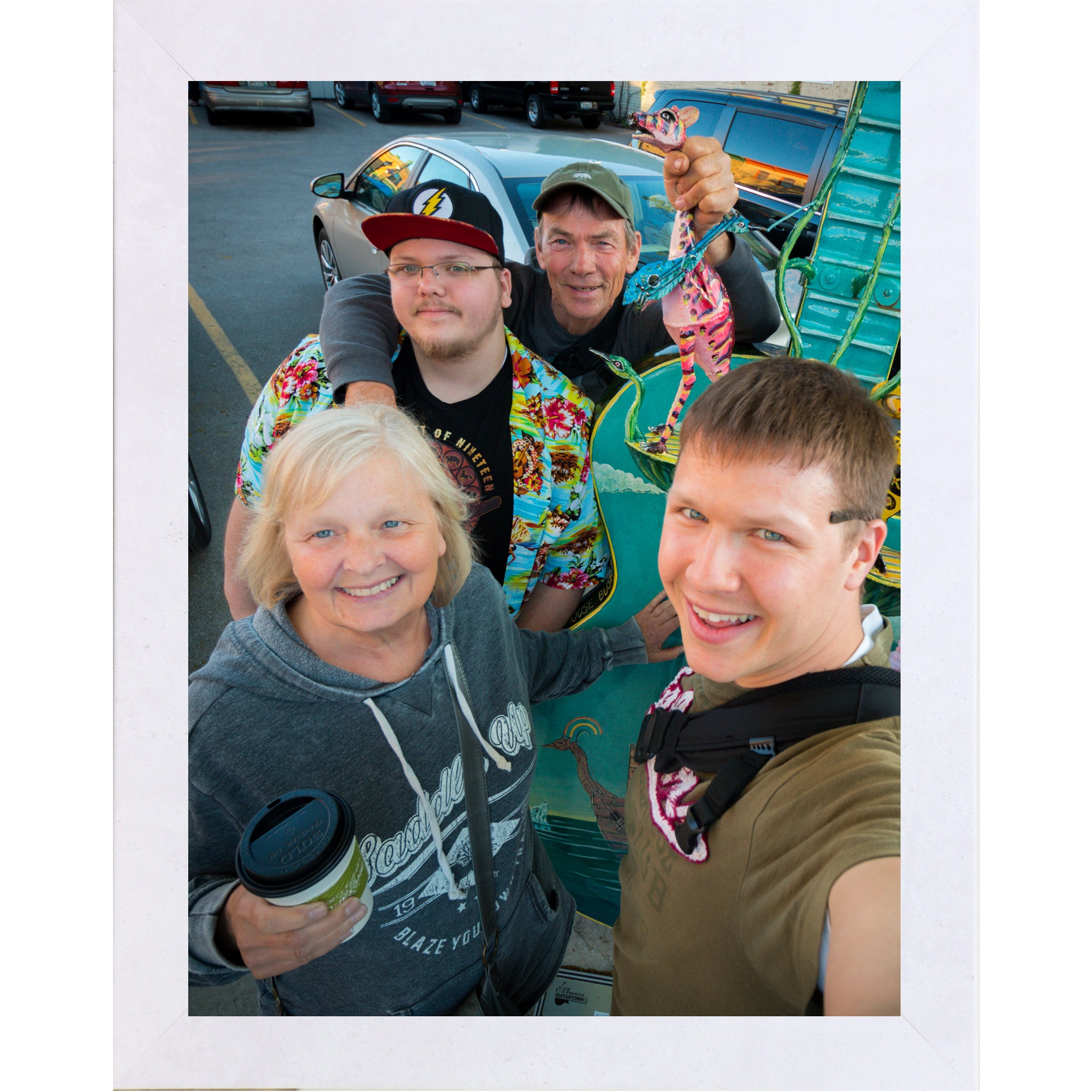 Terracotta white framed vertical custom photo print showing a professionally framed family photograph in a terracotta white 1 inch MDF frame with canvas finish