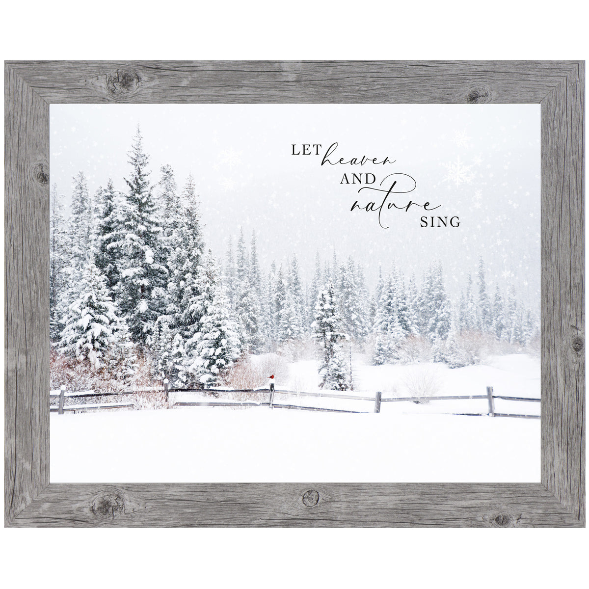 Framed winter wall art with red cardinal on snowy fence, falling snow, and phrase “Let Heaven and Nature Sing” with evergreen woods in background
