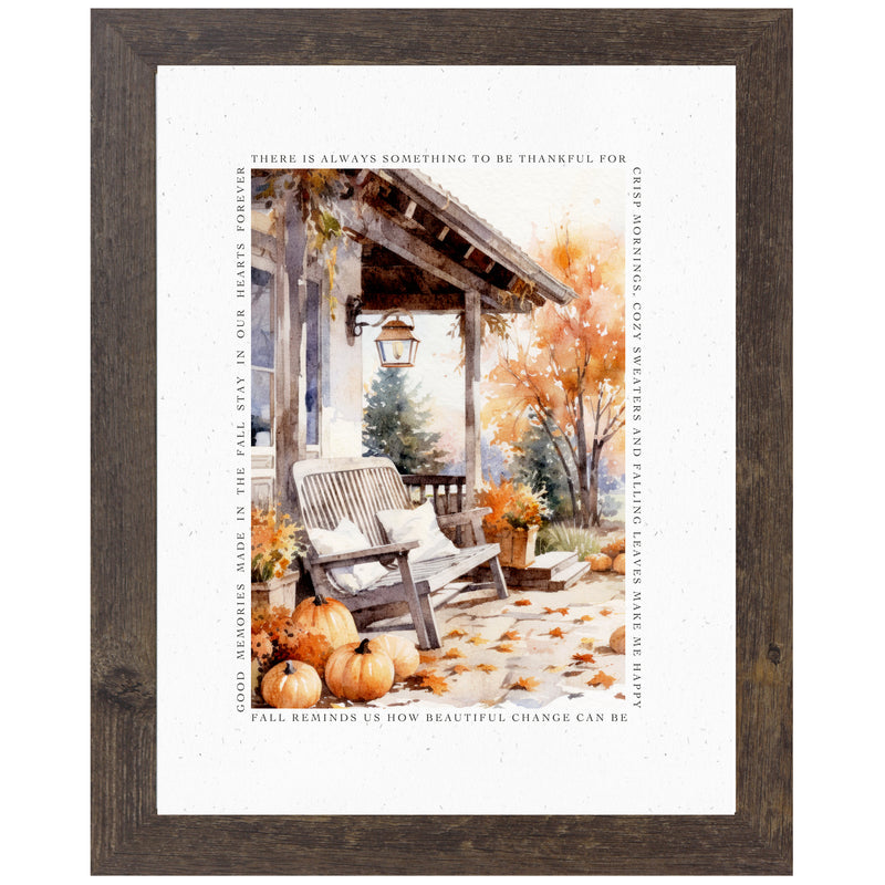 Framed fall wall art with porch scene, pumpkins, bench, fall trees, and the quote “Fall Reminds Us How Beautiful Change Can Be” with a white matte