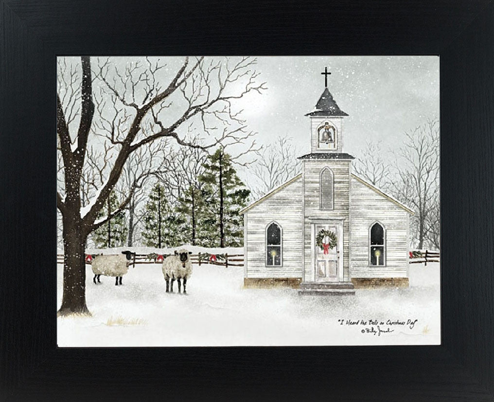 Christmas church framed wall art by Billy Jacobs featuring a snowy winter church with wreaths, sheep in the foreground, and falling snow